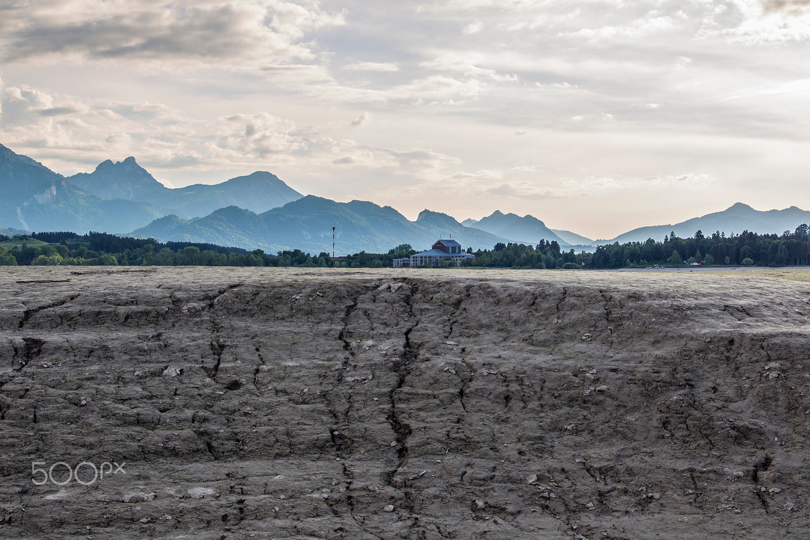 Canon EOS-1D Mark IV sample photo. View over the bottom of the dried forggensee on the alps in the photography