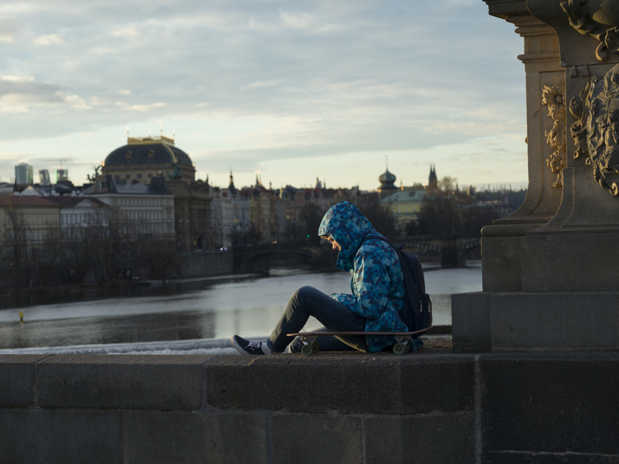 Hasselblad X1D-50c sample photo. Man sitting on charles bridge, prague, czech republic photography