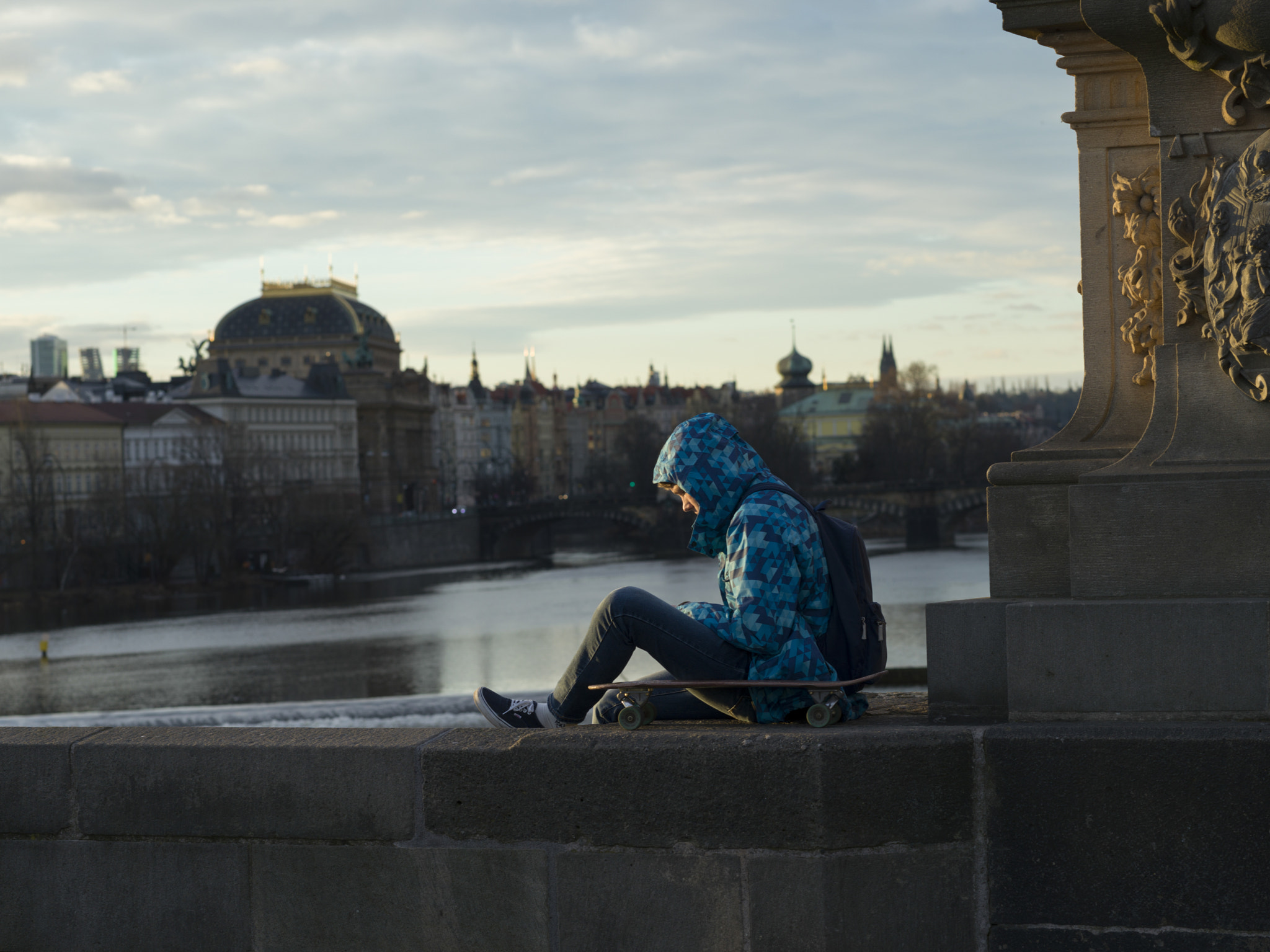 Hasselblad X1D-50c sample photo. Man sitting on charles bridge, prague, czech republic photography