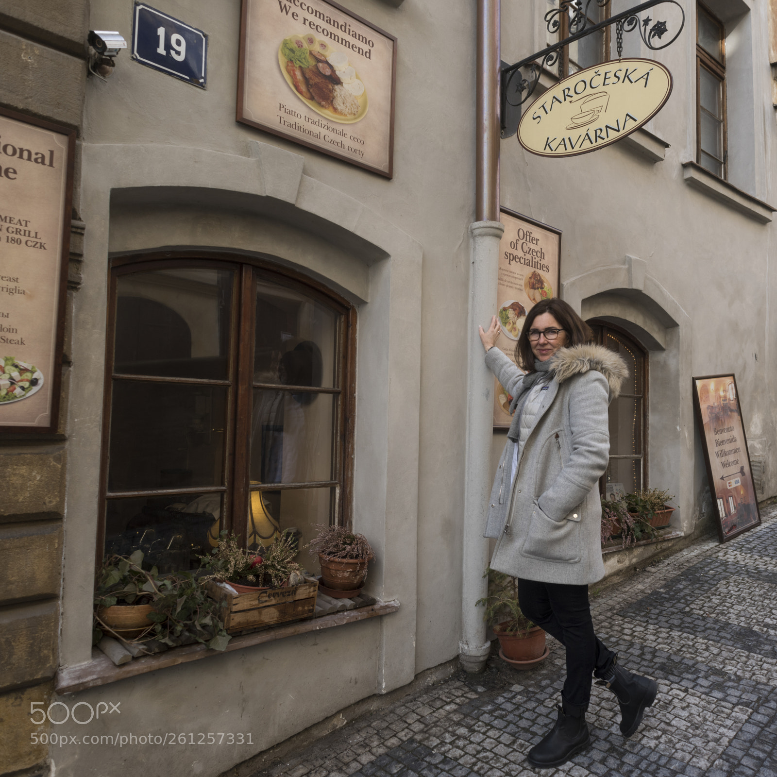 Nikon D810 sample photo. Woman standing outside cafe photography