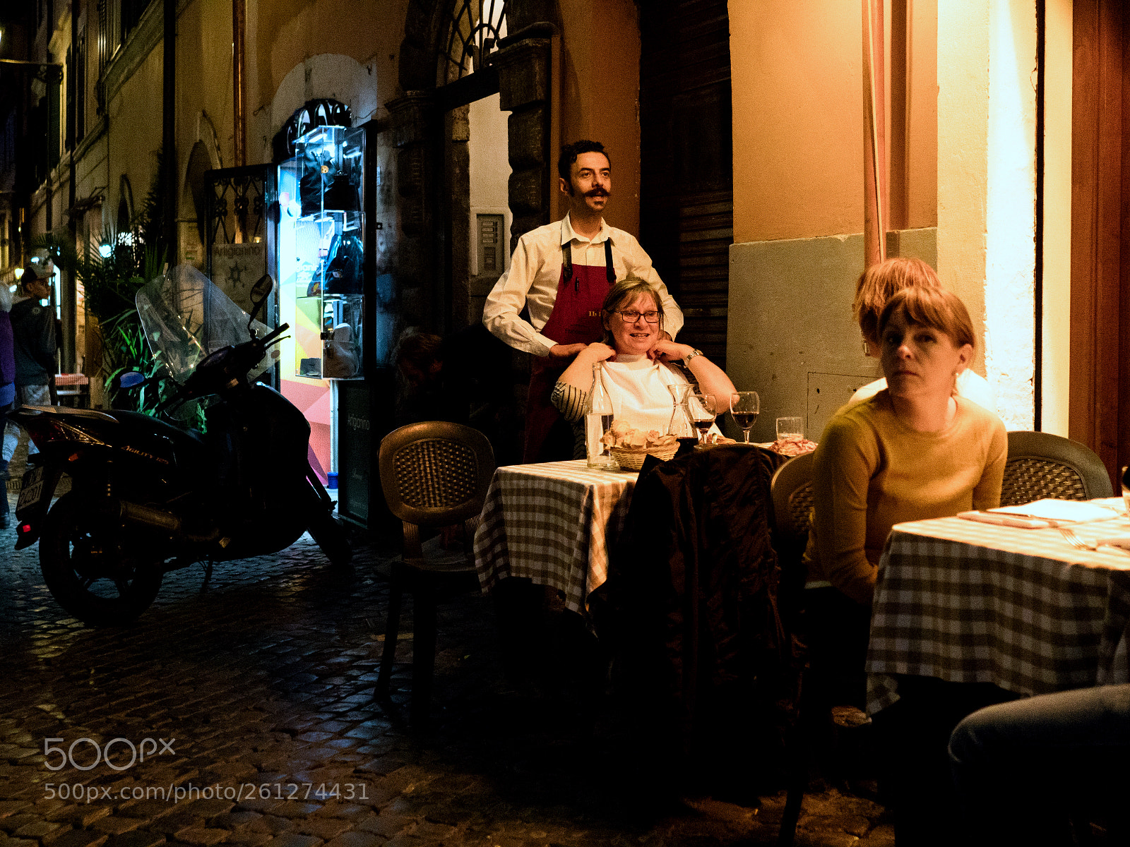 Sony a6500 sample photo. Waiter fitting a customer photography