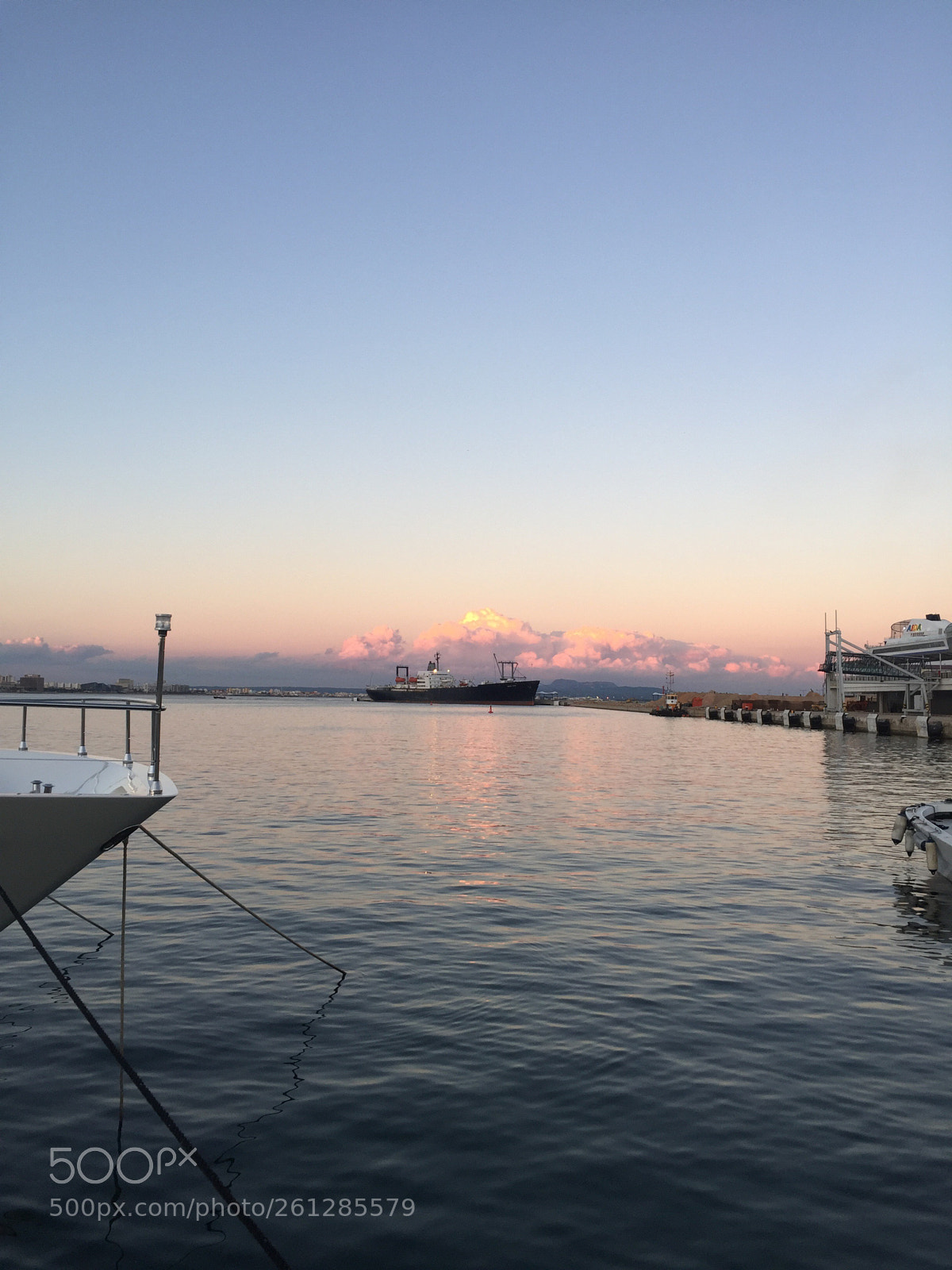 Apple iPhone 6 sample photo. Clouds reflected at dusk photography