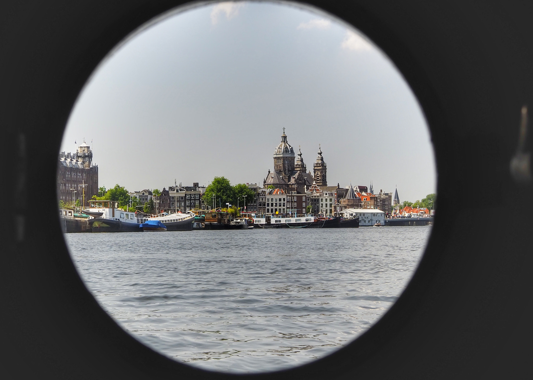 Olympus OM-D E-M10 III sample photo. Through the porthole photography