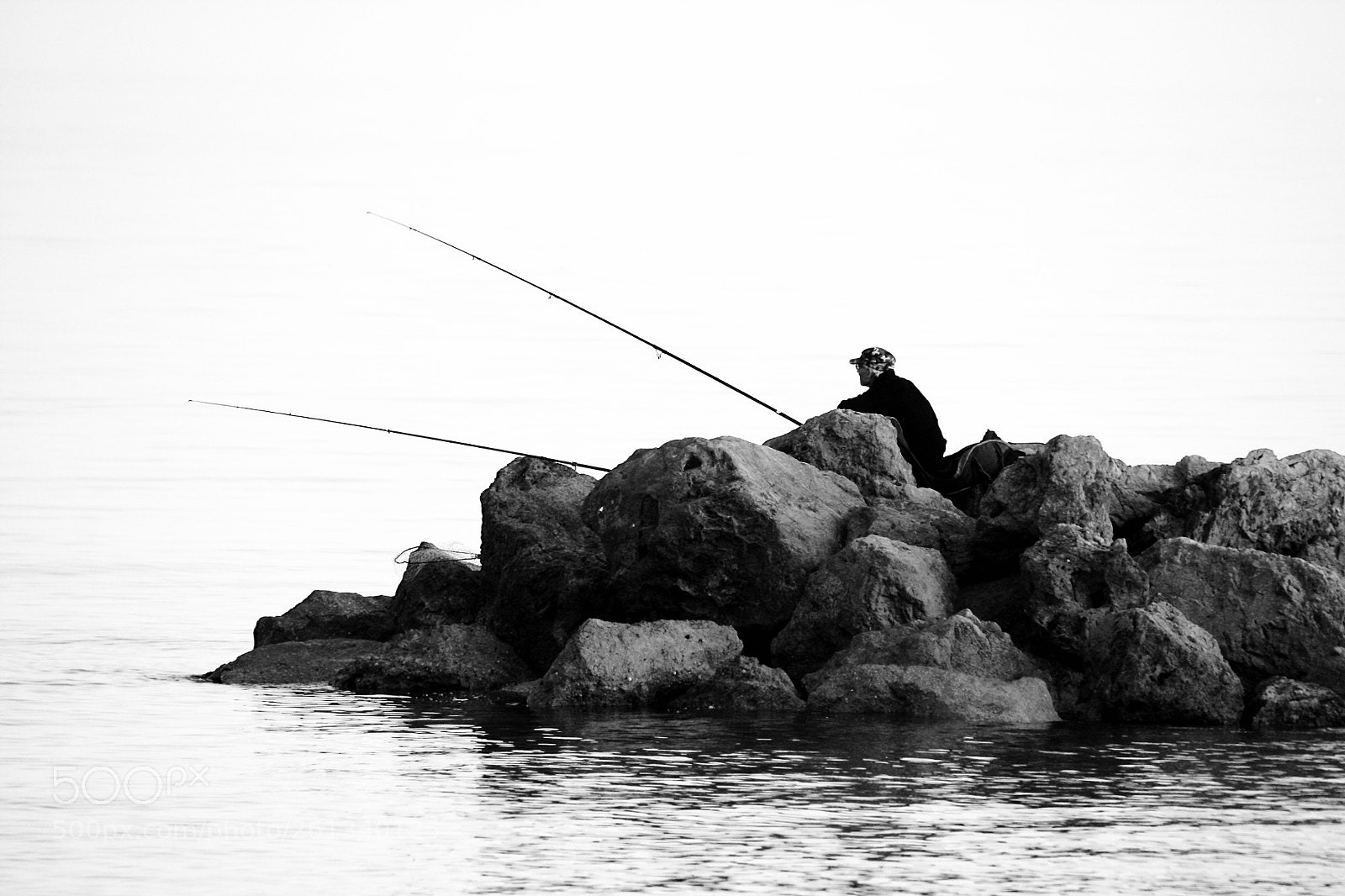 Canon EOS 450D (EOS Rebel XSi / EOS Kiss X2) sample photo. Fisherman on his rock photography