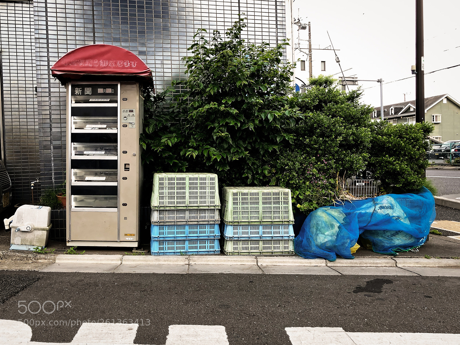 Apple iPhone X sample photo. Last newspaper box in photography