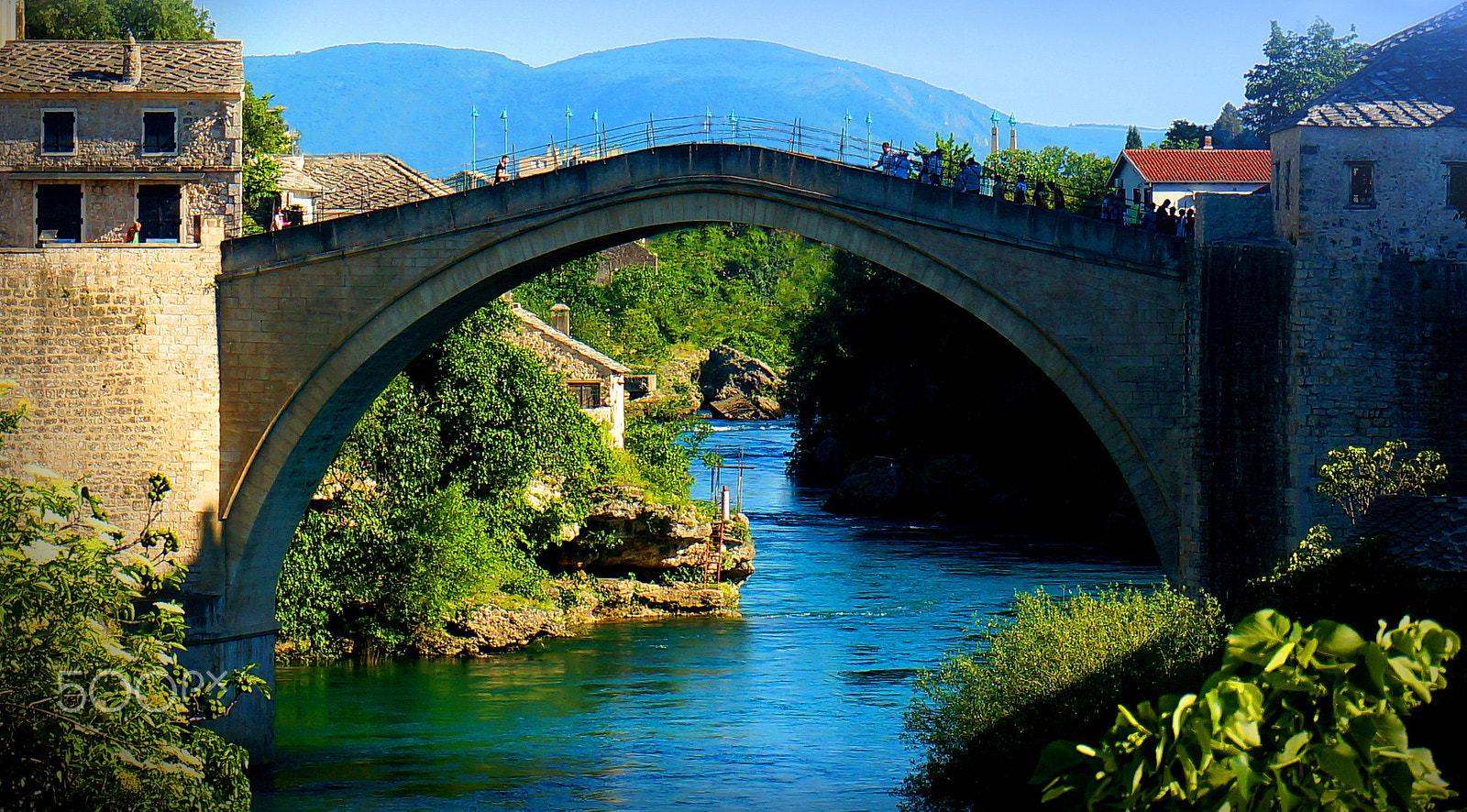 Sony Alpha NEX-6 sample photo. Yellow & blue bridge, mostar photography