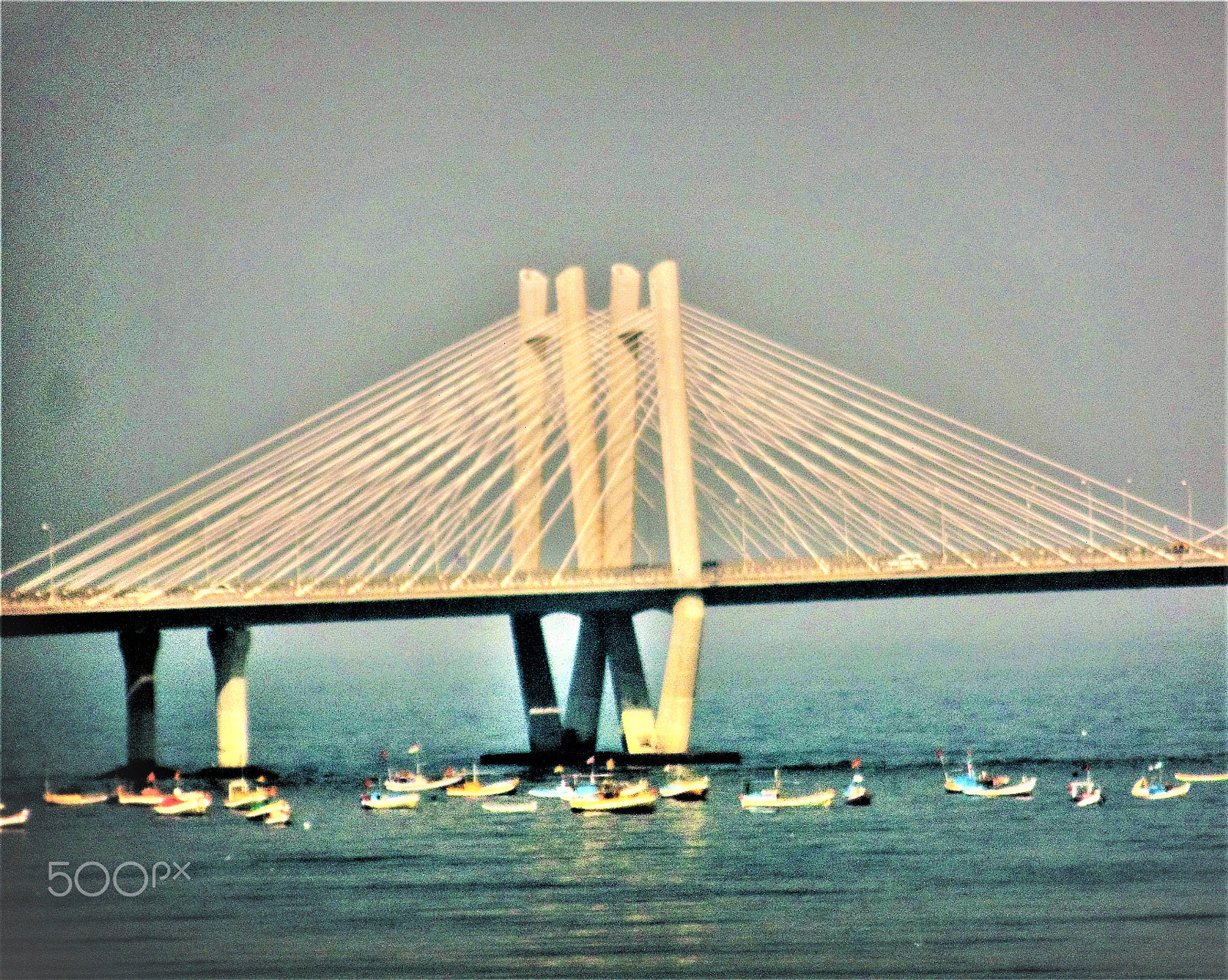 Nikon COOLPIX S9200 sample photo. Mumbai sea-link bridge and fishing boats at sunset photography