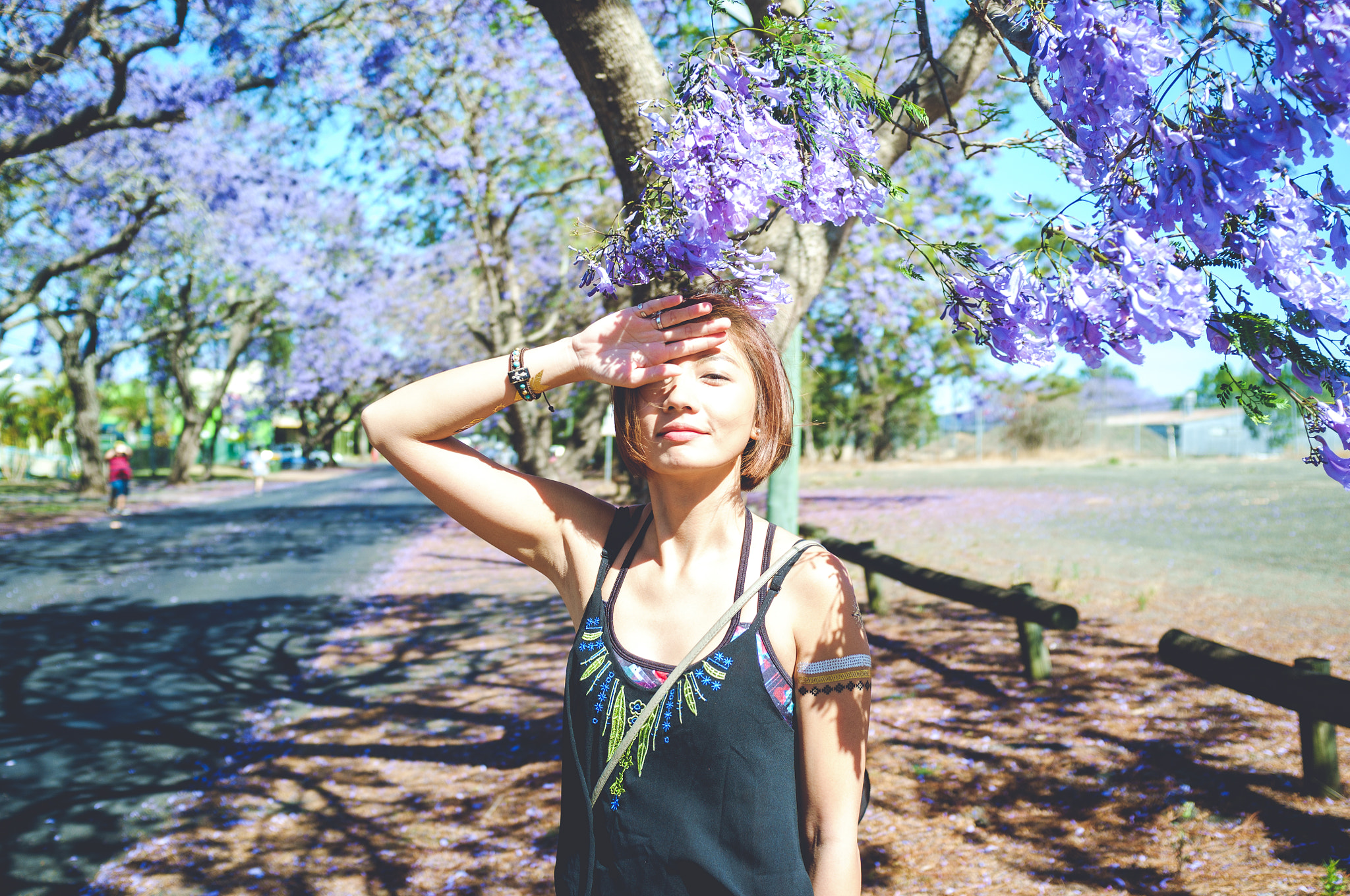 Fujifilm FinePix X100 sample photo. Jacaranda tree & girl photography