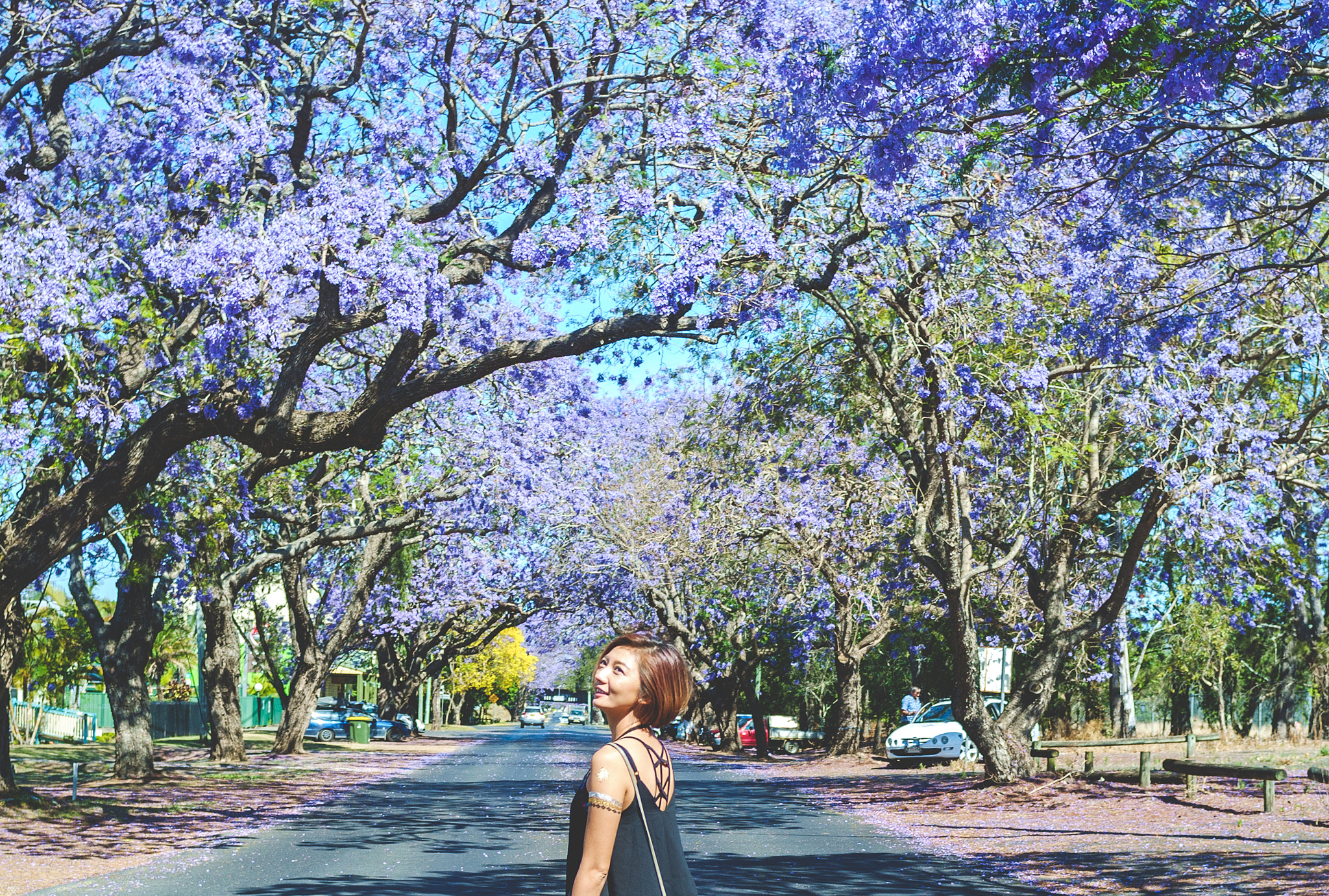 Fujifilm FinePix X100 sample photo. Jacaranda tree & girl photography