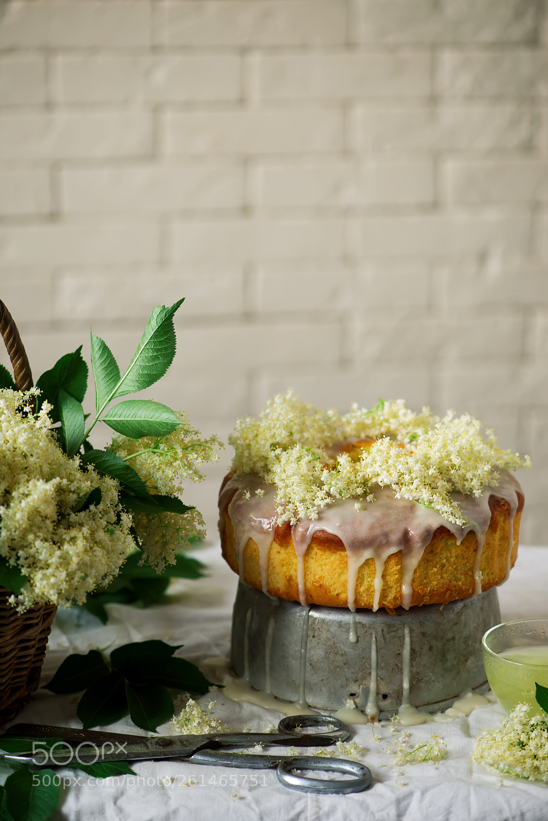 Nikon D610 sample photo. Elderflower and orange bundt photography