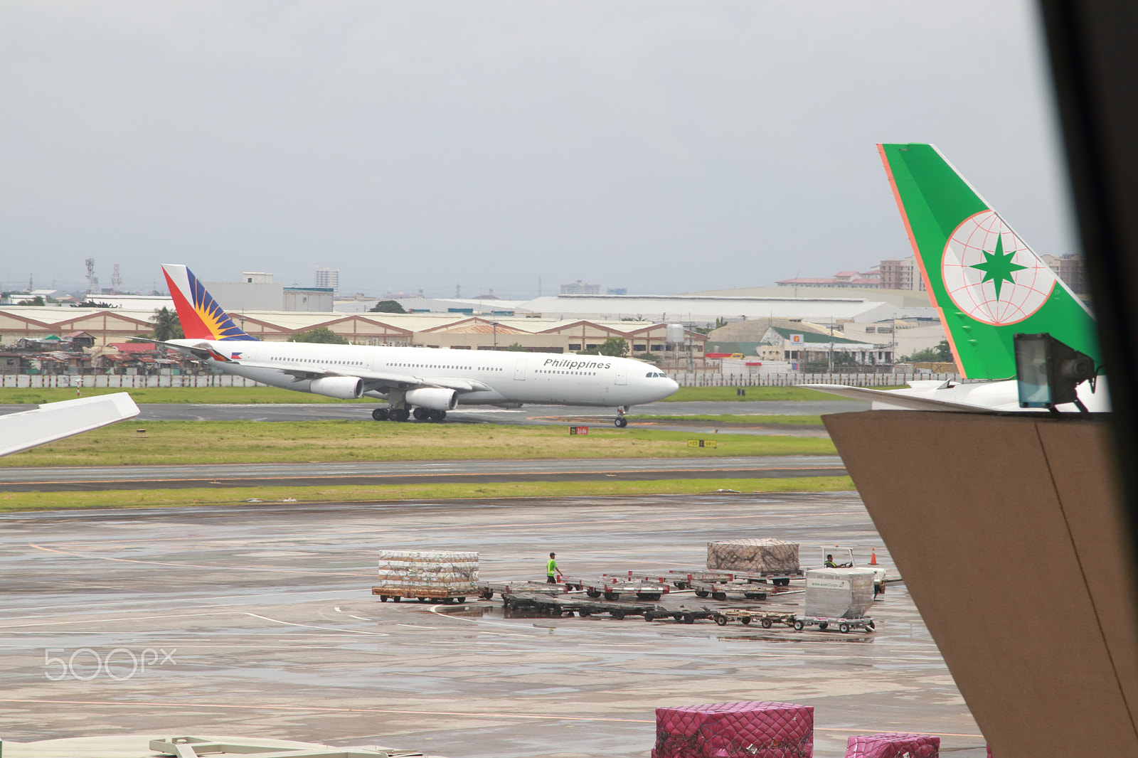 Canon EOS 80D + Canon EF 24-105mm F4L IS USM sample photo. Airplanes in naia philippines photography