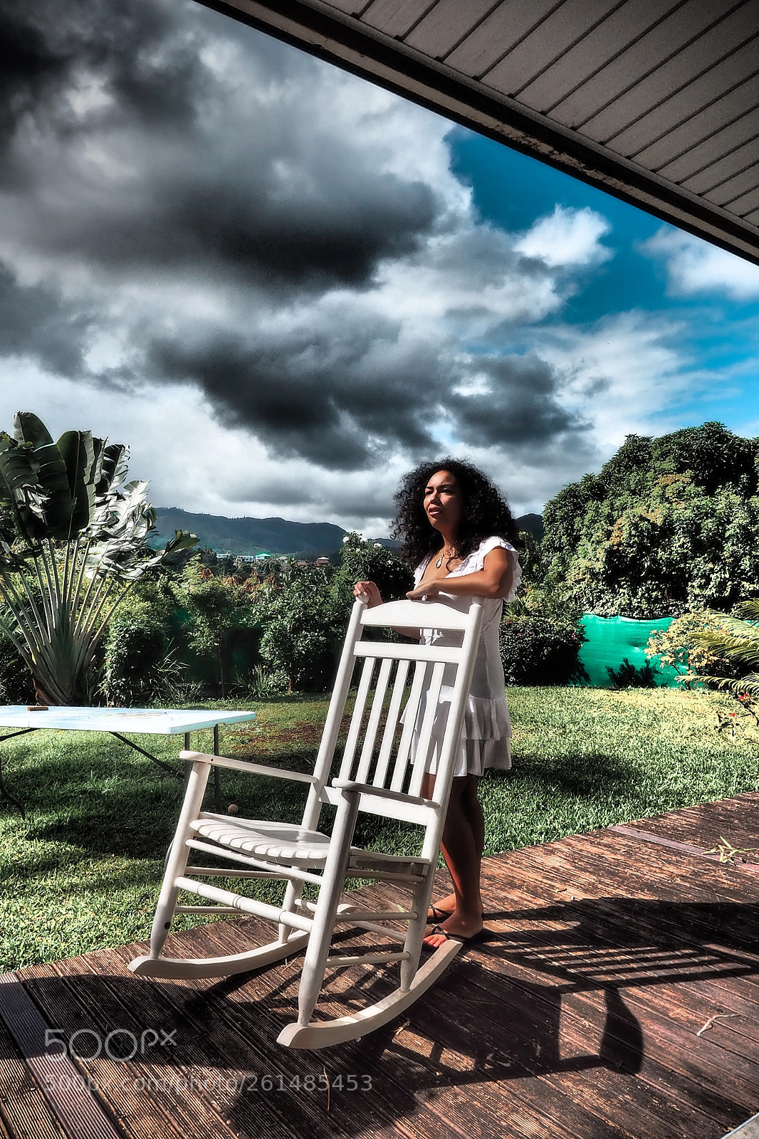 Olympus OM-D E-M10 II sample photo. Dramatic rocking chair photography