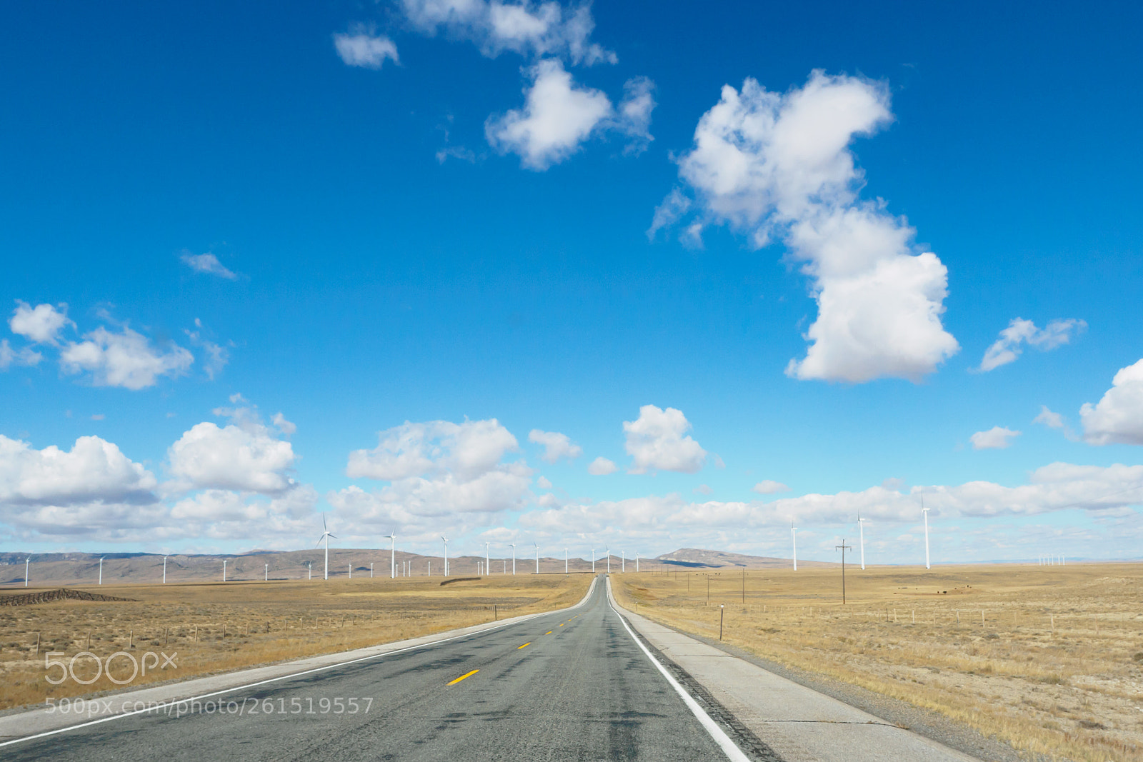 Olympus OM-D E-M10 II sample photo. Wind mill road photography