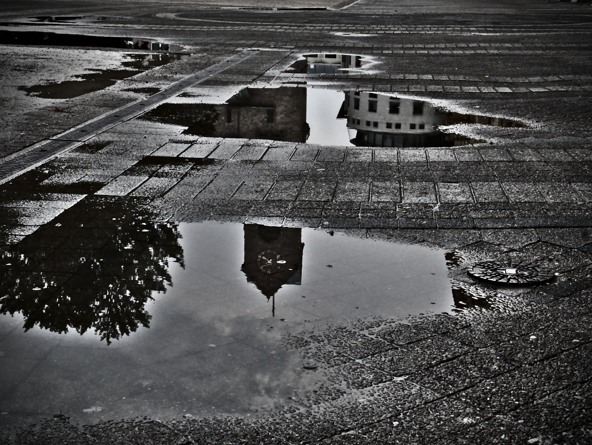 Panasonic Lumix DC-GX9 sample photo. Belfry in puddle photography