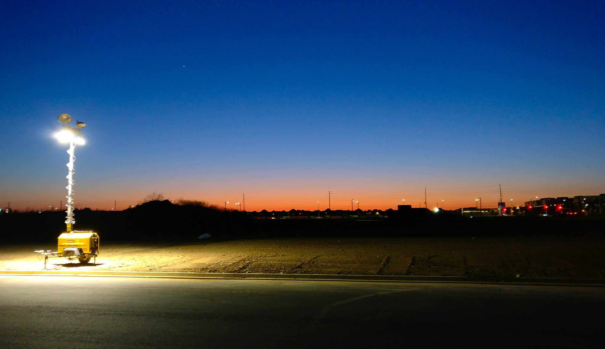 OnePlus A3000 sample photo. This a sunset in a park near us with a construction site lamp that was running photography