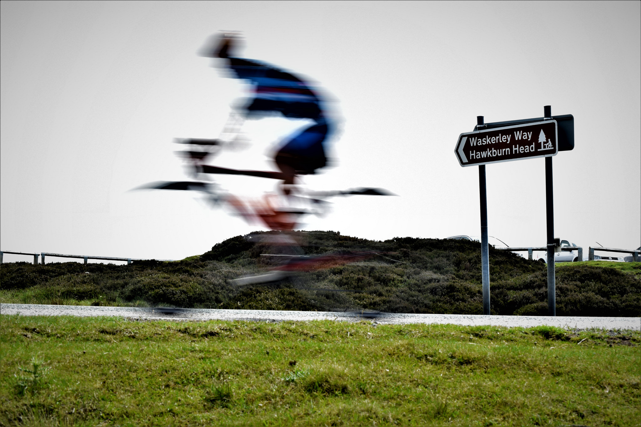 Nikon D3300 sample photo. Passing cyclist photography