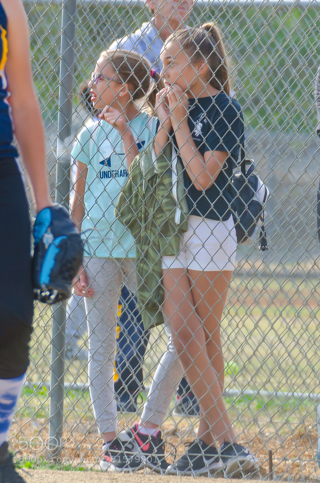 Nikon D7000 sample photo. Girls at the fence photography
