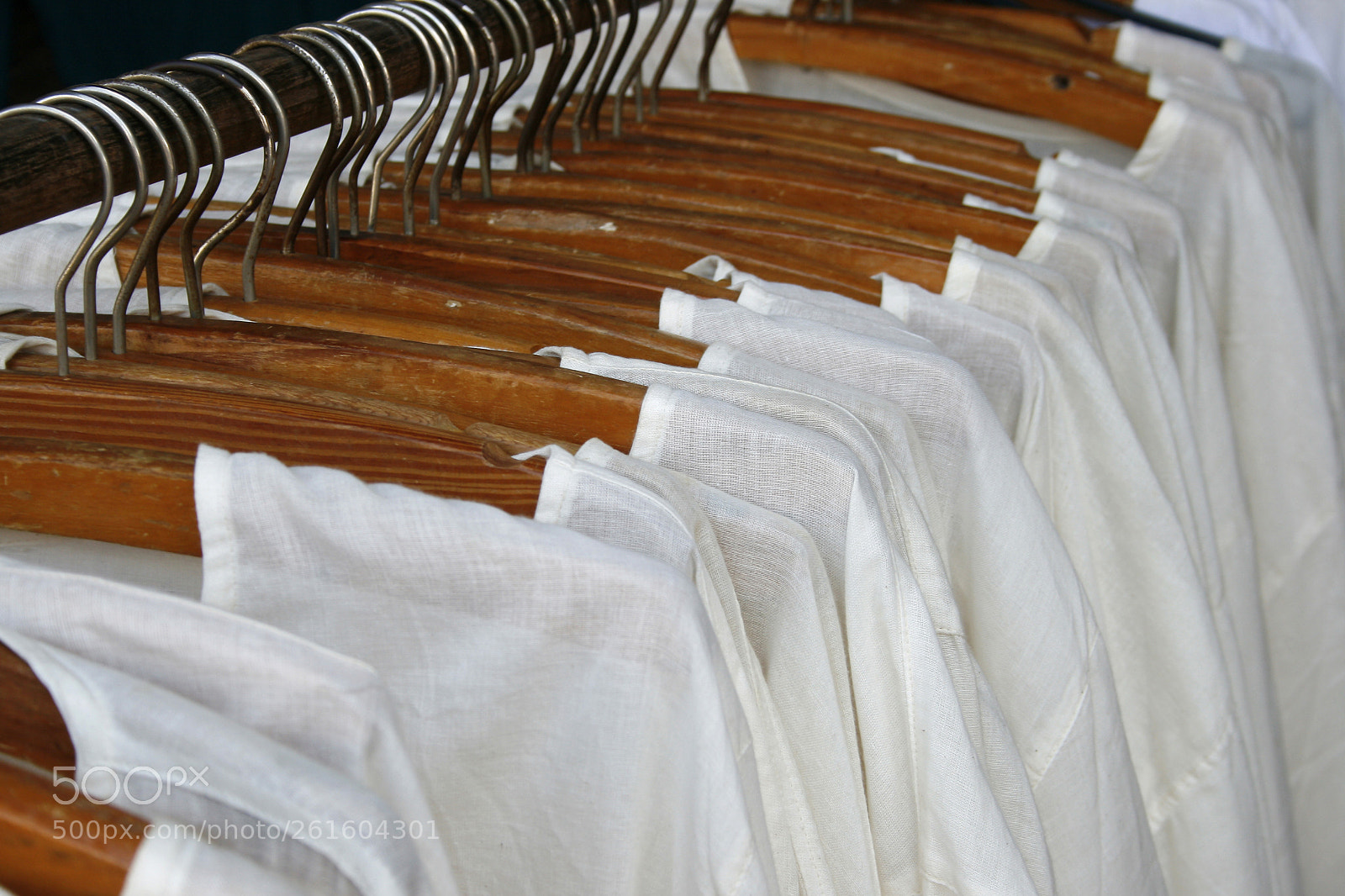 Canon EOS 400D (EOS Digital Rebel XTi / EOS Kiss Digital X) sample photo. Row of white shirts photography