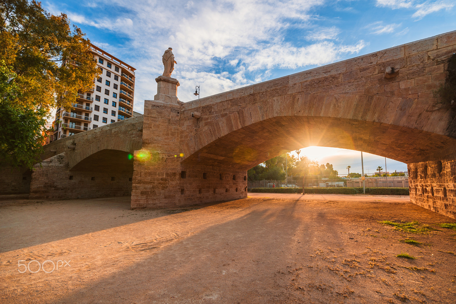 Sony a99 II sample photo. A bright sunset in the park of turia before the rain. valencia, spain. photography