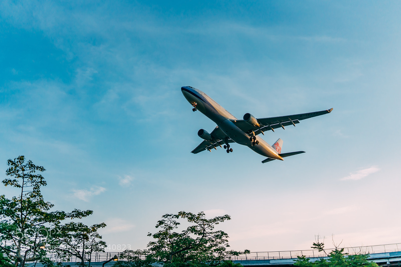 Sony a7 III sample photo. Airplane at blue hour photography