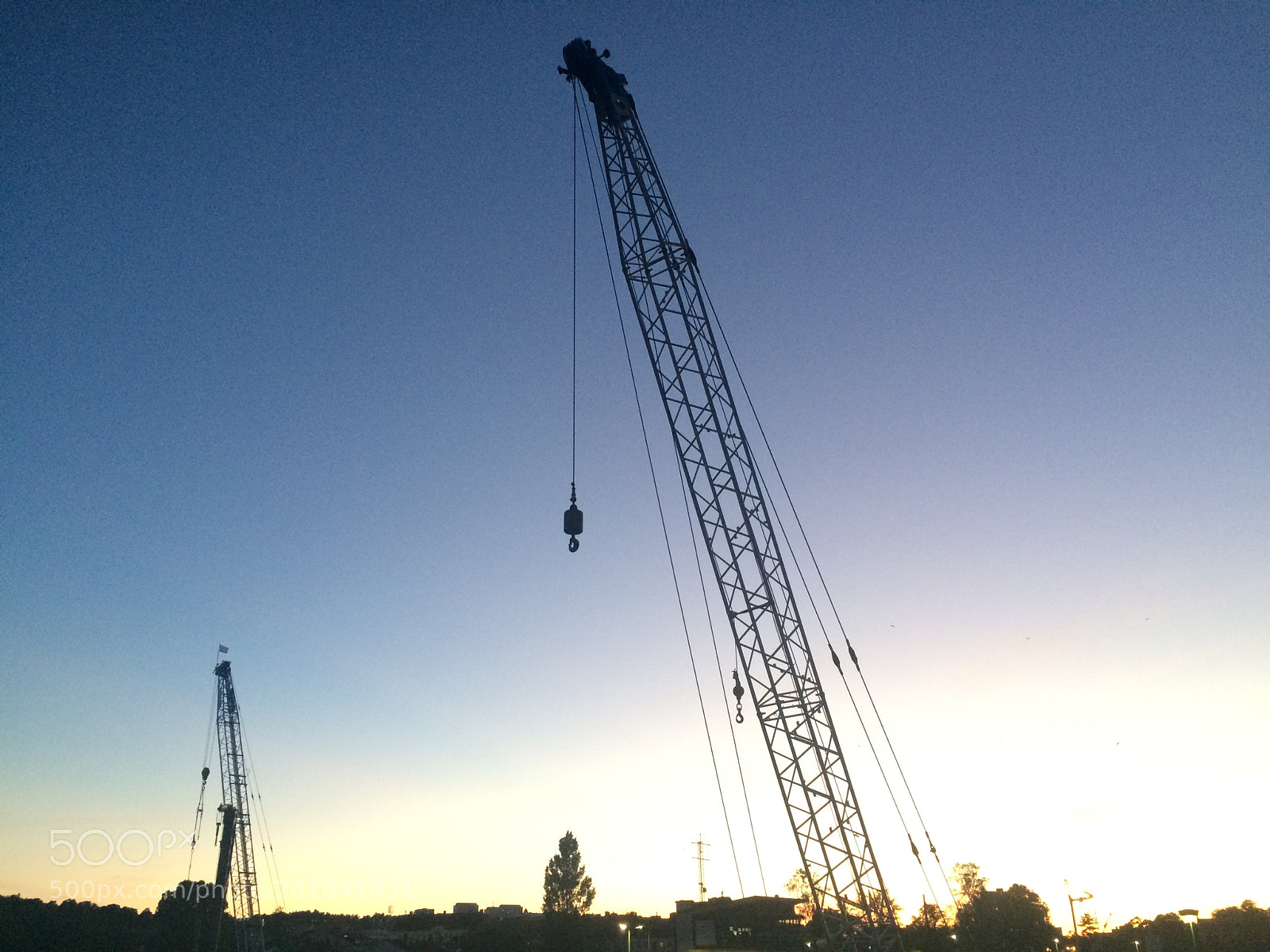 Apple iPhone 5s sample photo. Crane during sunset photography
