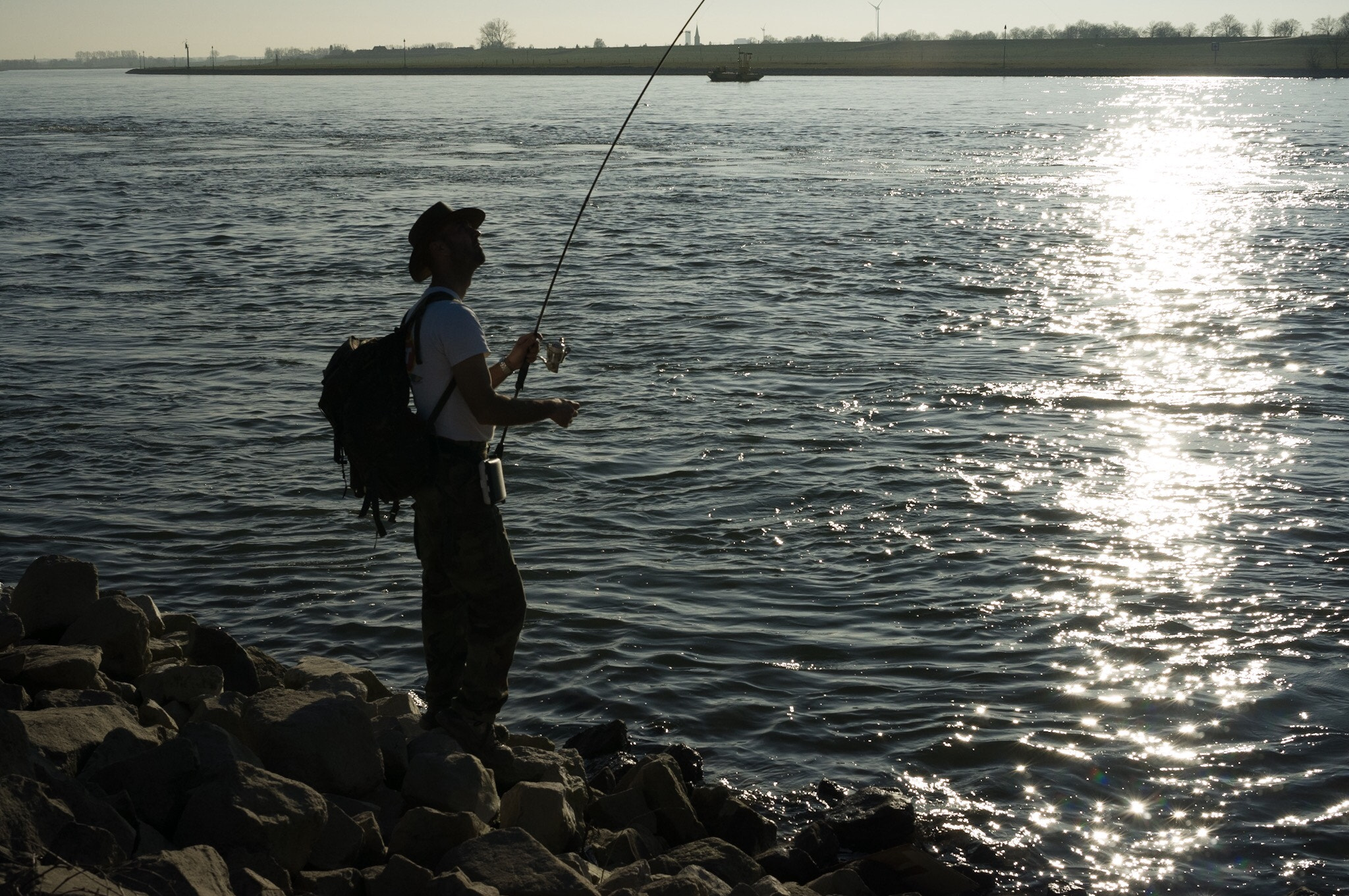 Ricoh GXR A12 sample photo. Fisherman  photography