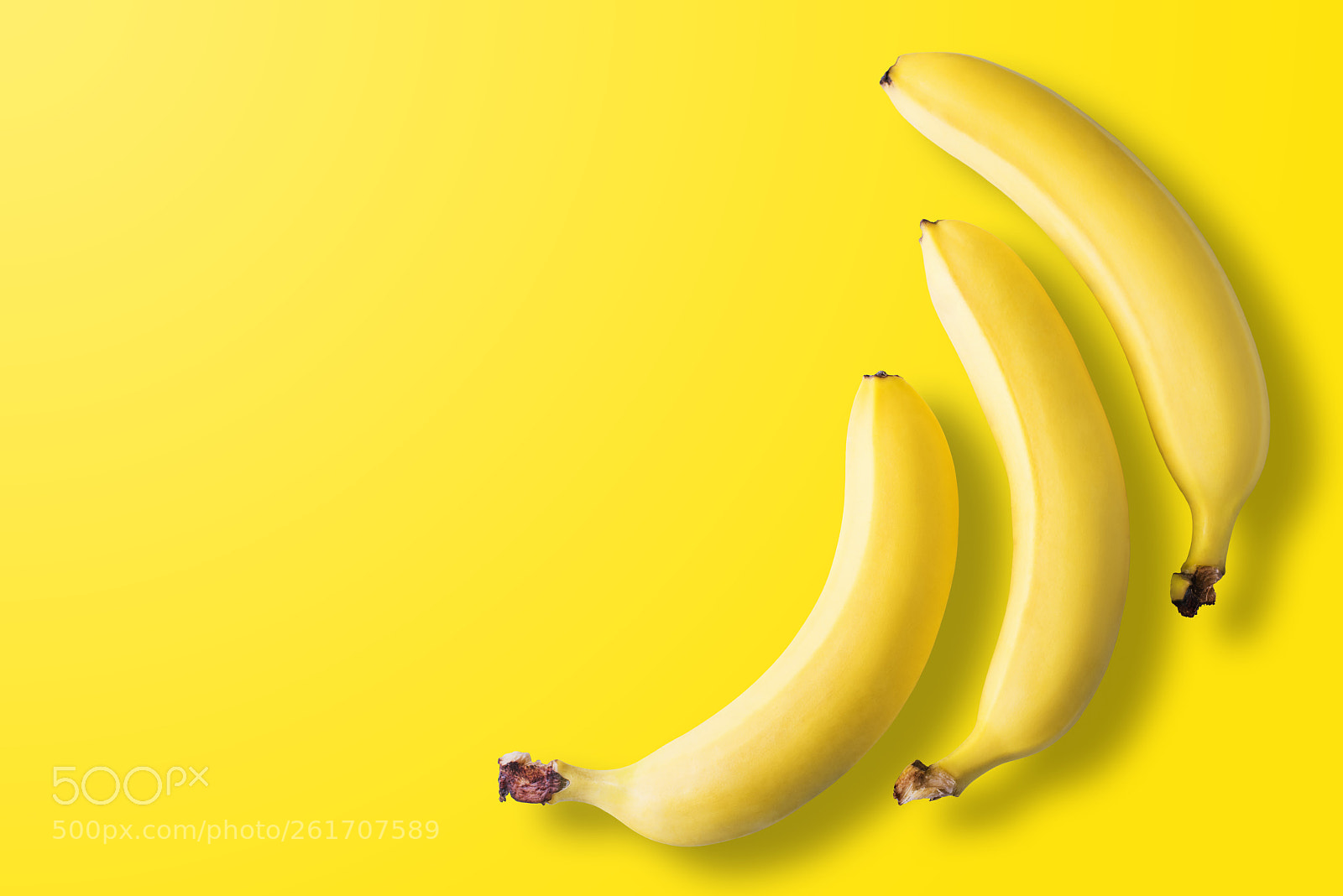 Nikon D810 sample photo. Bananas on pastel yellow photography