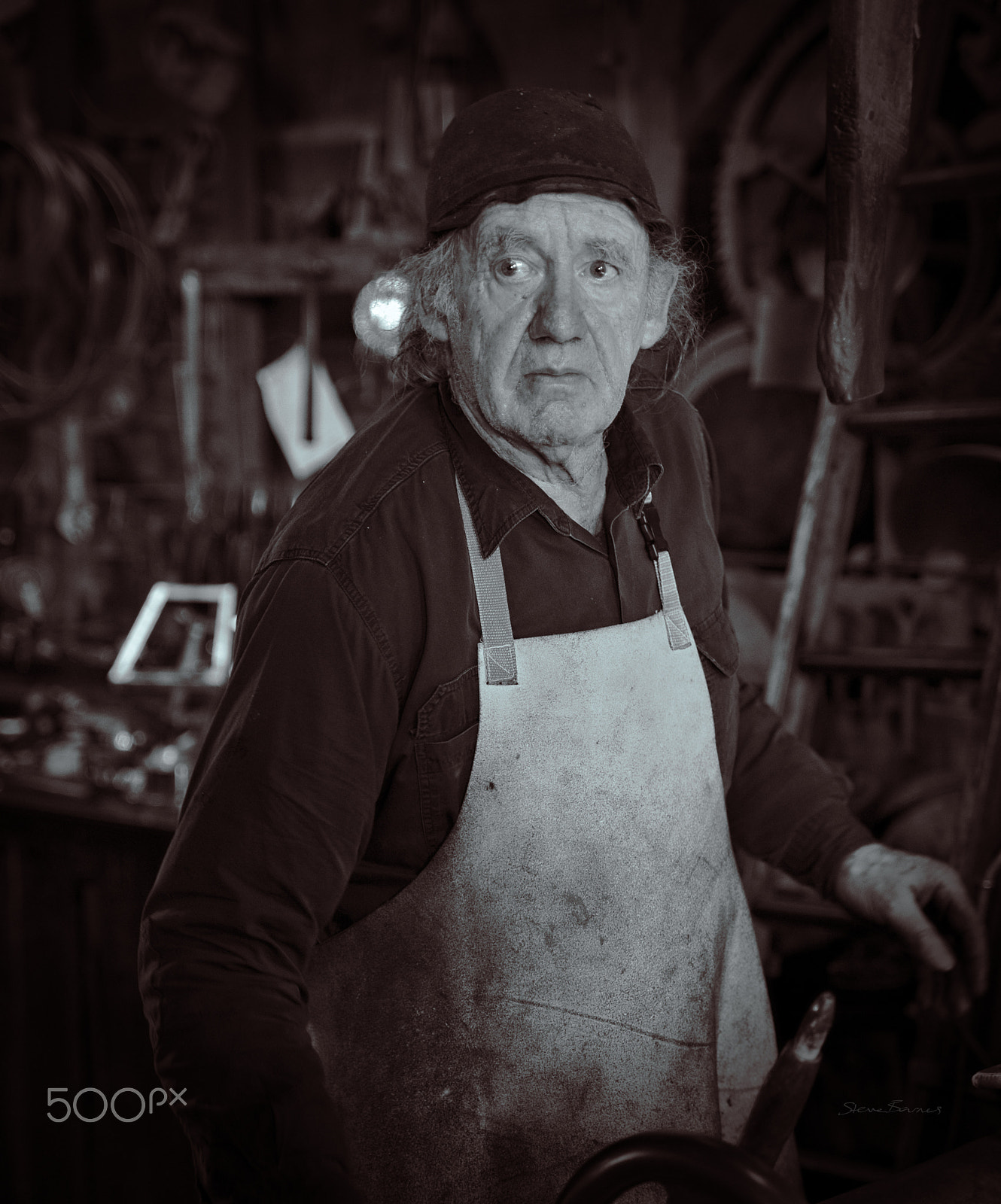Pentax K-1 sample photo. The ironmonger works amidst a shed full of tools and creations see sovereignhill.com.au photography