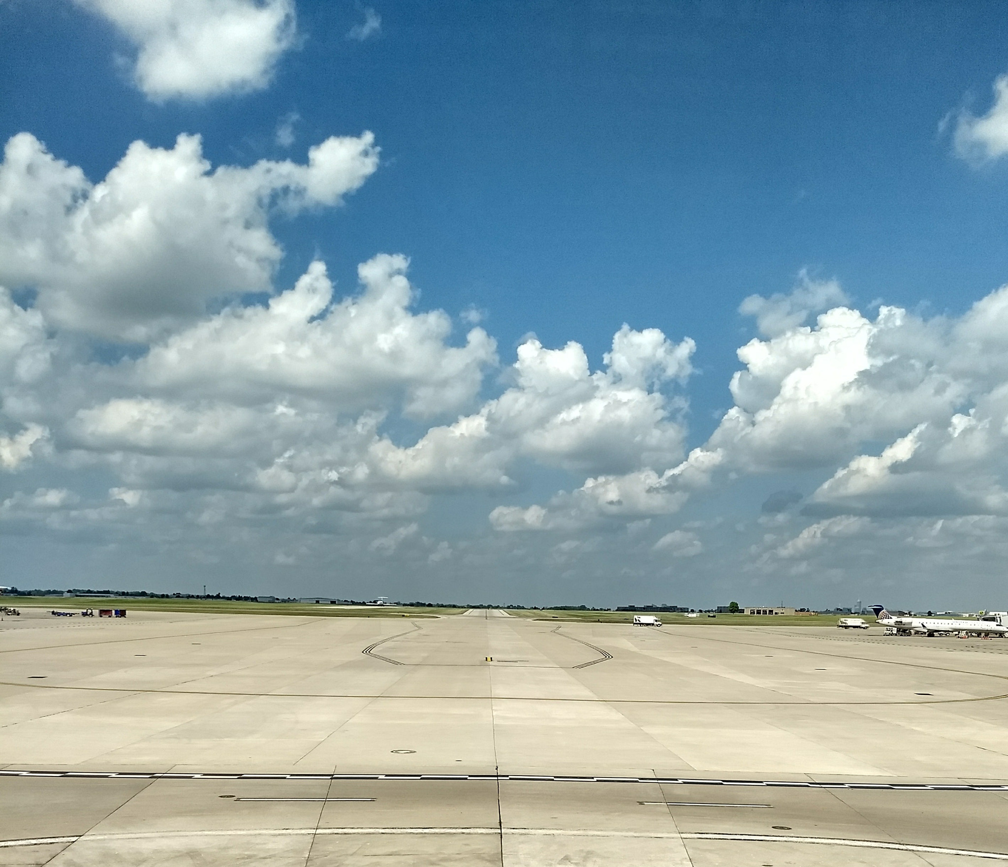 Motorola Moto G (5) Plus sample photo. Tarmac clouds photography