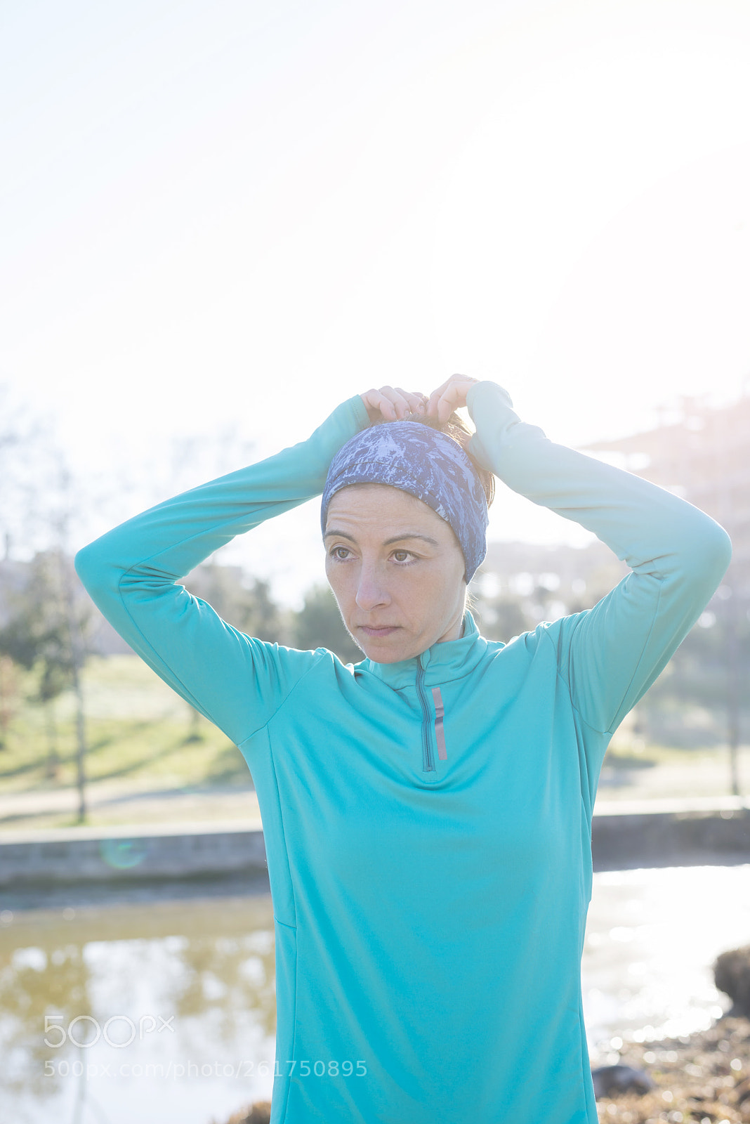 Nikon D610 sample photo. Sport woman tying ponytail photography