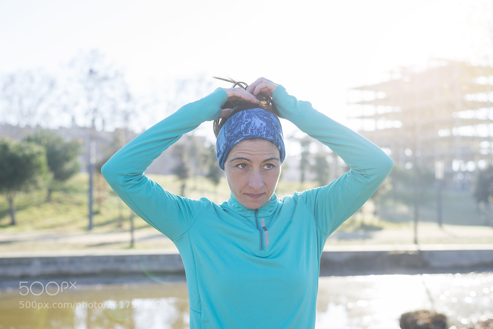 Nikon D610 sample photo. Sport woman tying ponytail photography