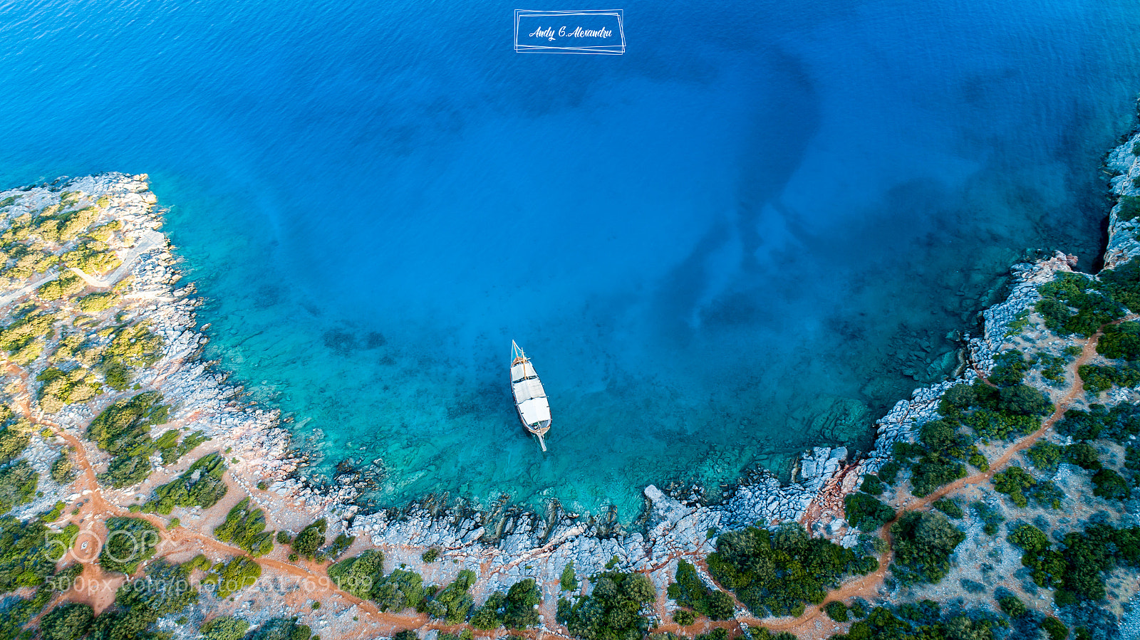 DJI FC6310 sample photo. Boat in blue sea photography