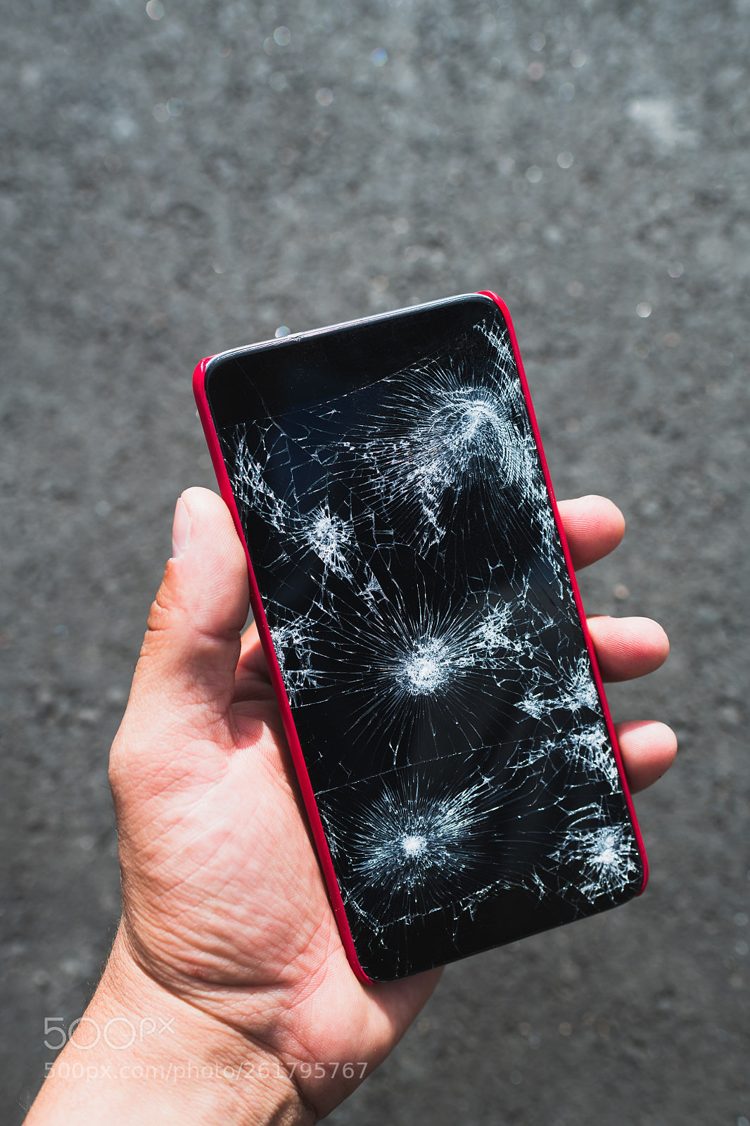 Nikon D850 sample photo. Person holding broken smartphone photography