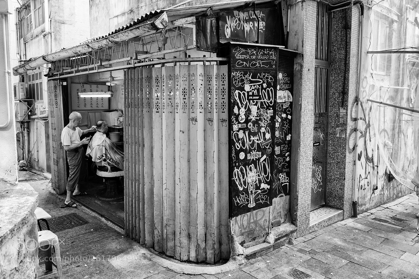 Fujifilm X-T2 sample photo. Street barber shop photography