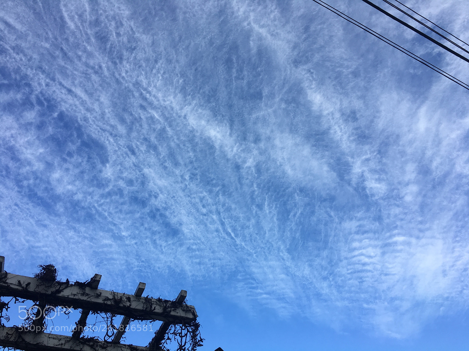 Apple iPhone 6s sample photo. Wispy clouds photography