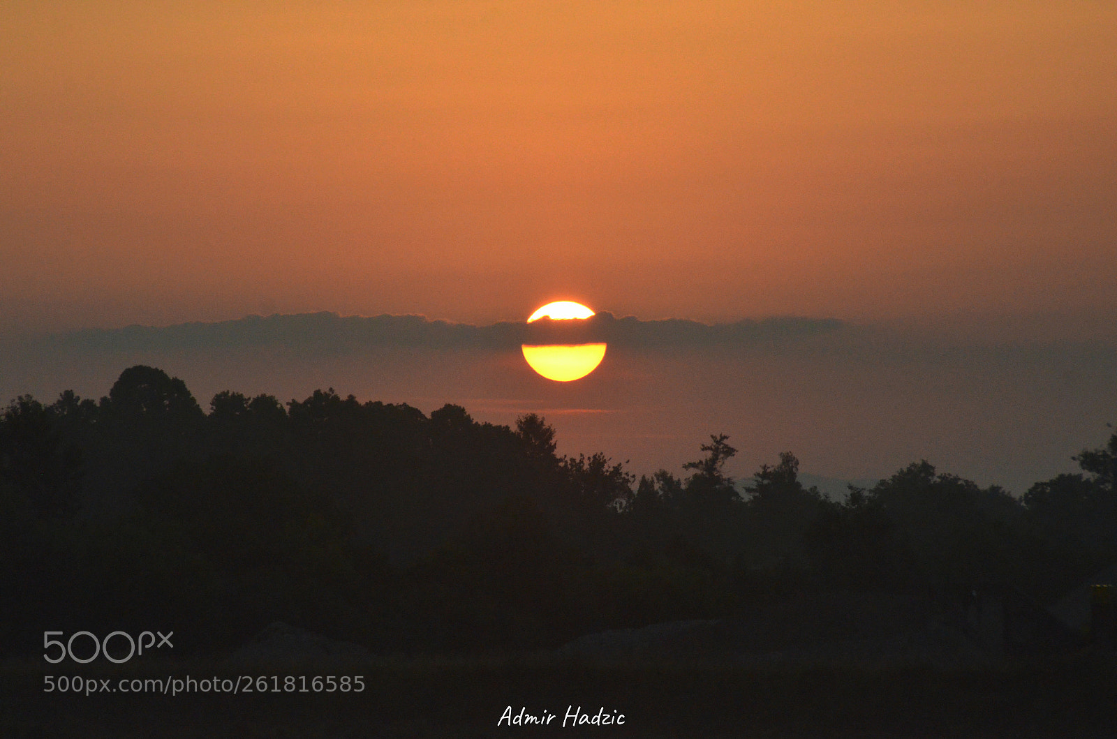 Nikon D7000 sample photo. Sunrise behind clouds photography