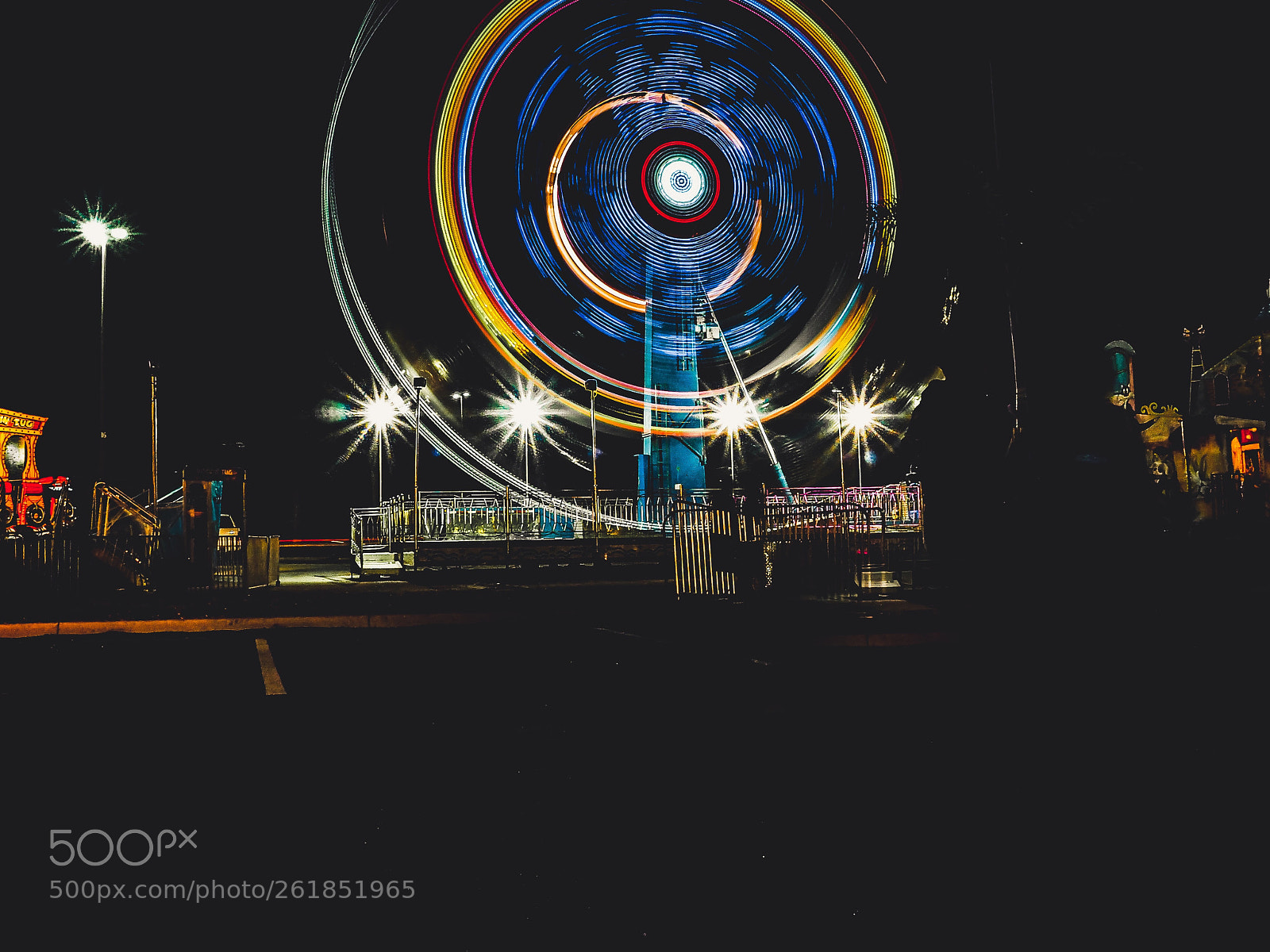 Olympus OM-D E-M10 sample photo. Fairgrounds long exposure part photography