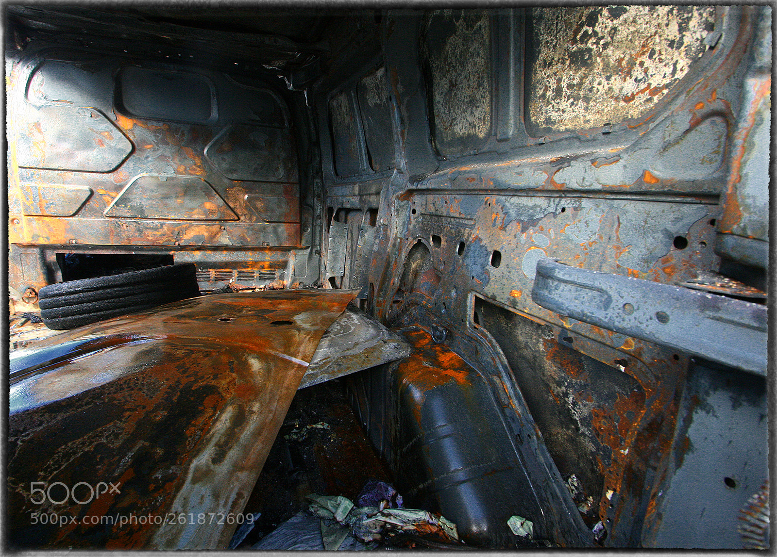 Canon EOS 400D (EOS Digital Rebel XTi / EOS Kiss Digital X) sample photo. Inside burnt out van photography