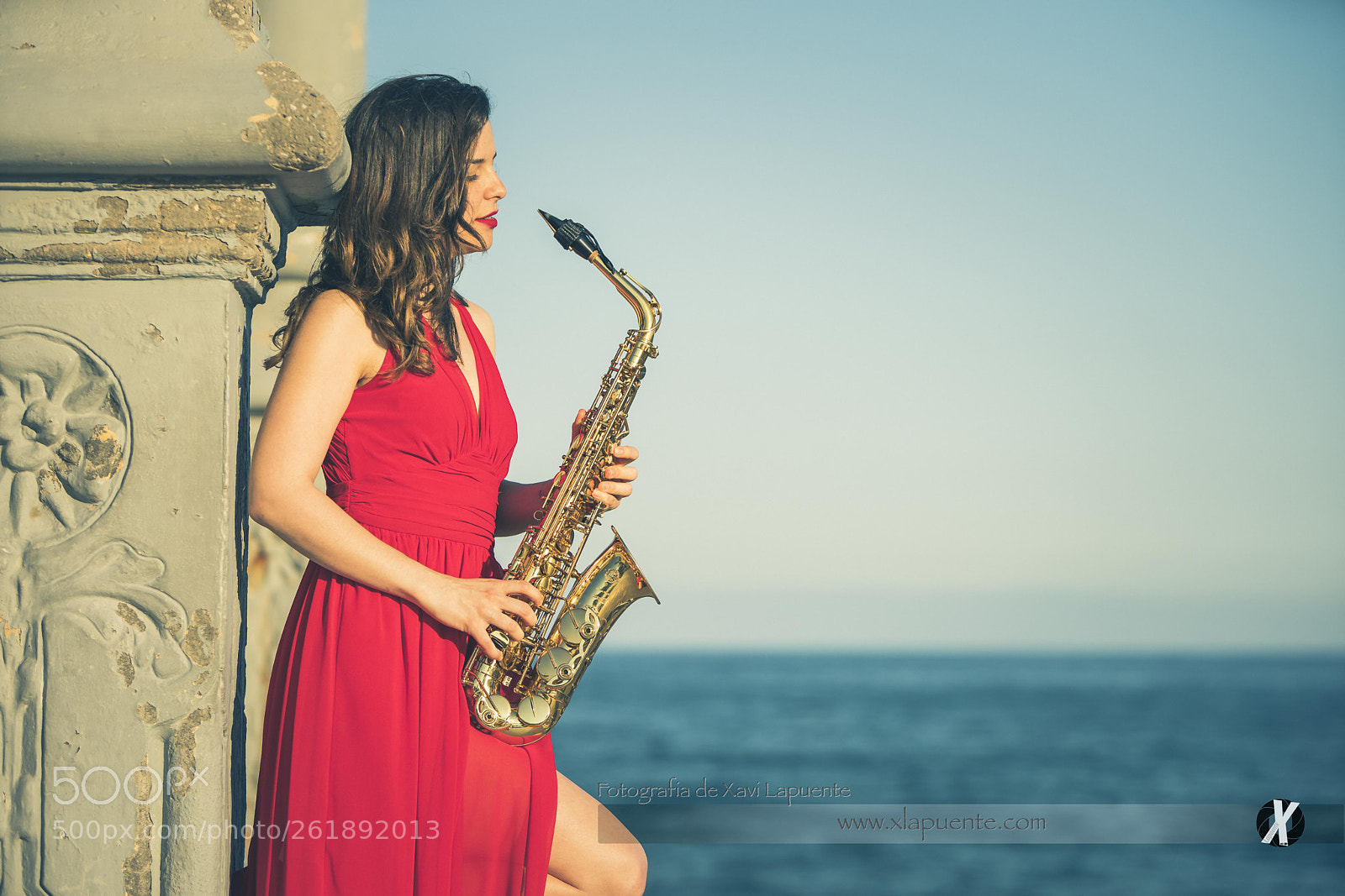 Sony a9 sample photo. Saxophonist with red dress photography