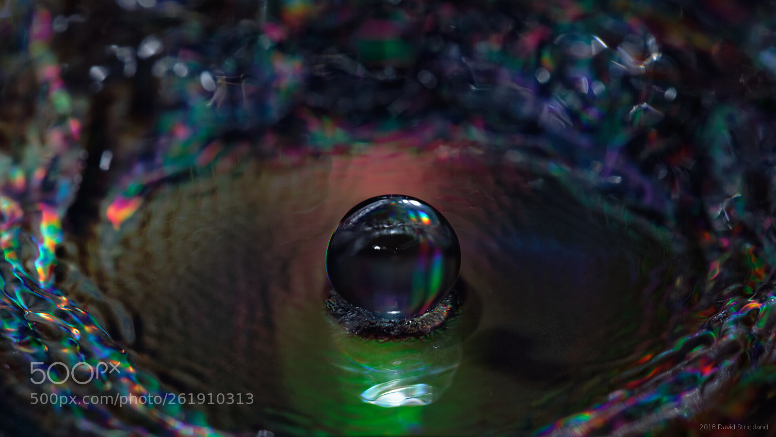 Canon EF 100mm F2.8L Macro IS USM sample photo. Rainbow drop splashdown photography