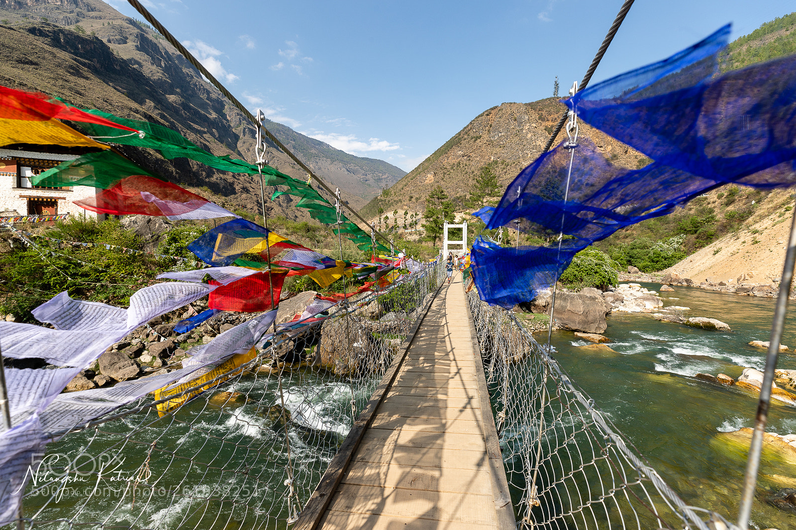 Canon EOS-1D X Mark II sample photo. Prayer flags over suspension photography