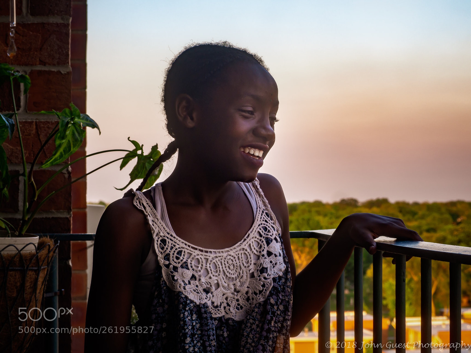 Olympus OM-D E-M10 II sample photo. Jaque on balcony photography