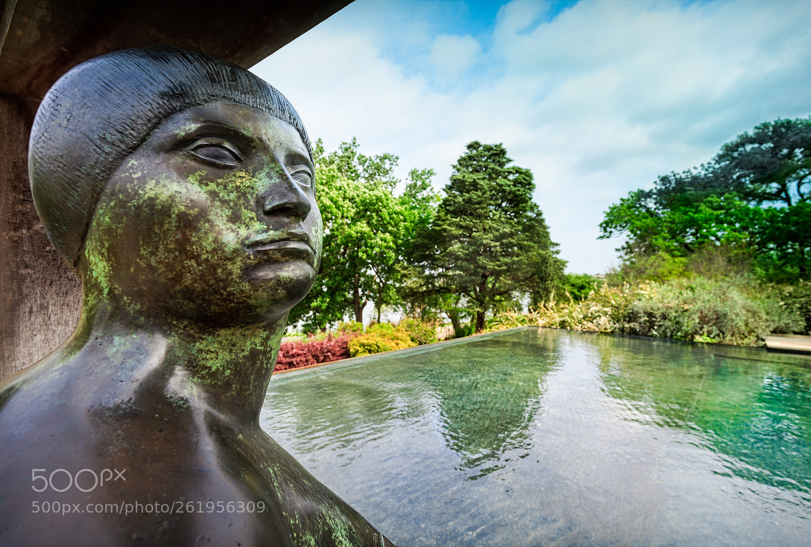 Canon EOS 5D Mark II sample photo. Bronze statue beside reflecting photography