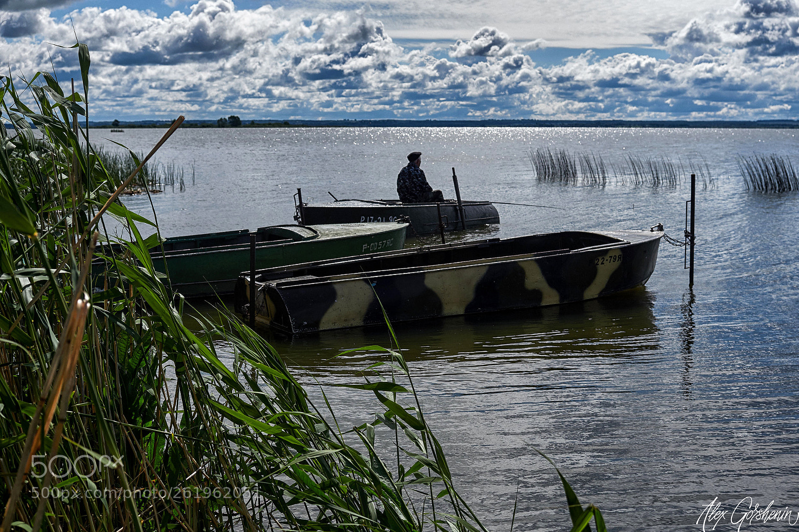 Olympus OM-D E-M1 Mark II sample photo. Fisherman on lake nero photography