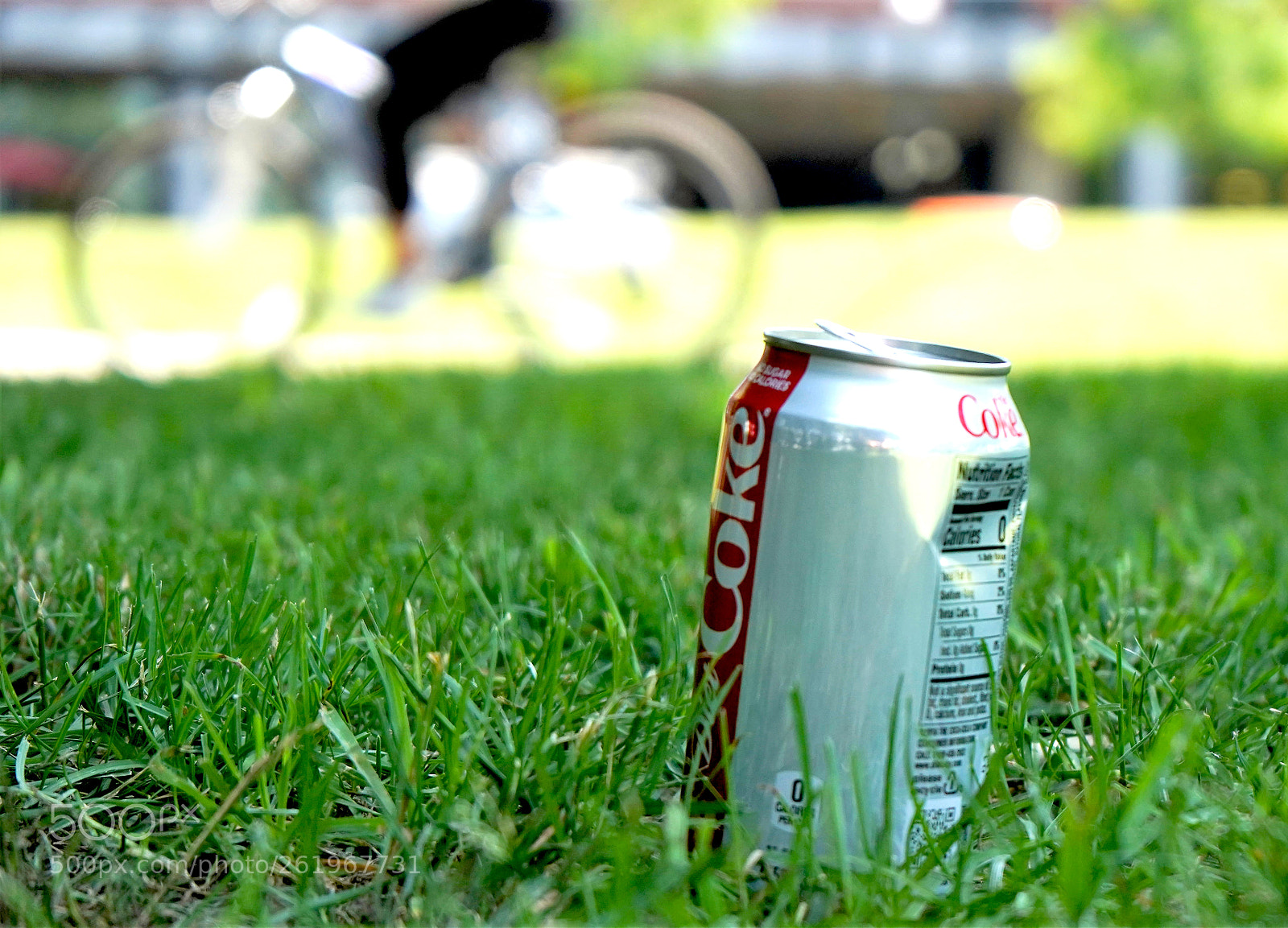 Sony a7 III sample photo. Bike passing a coke photography