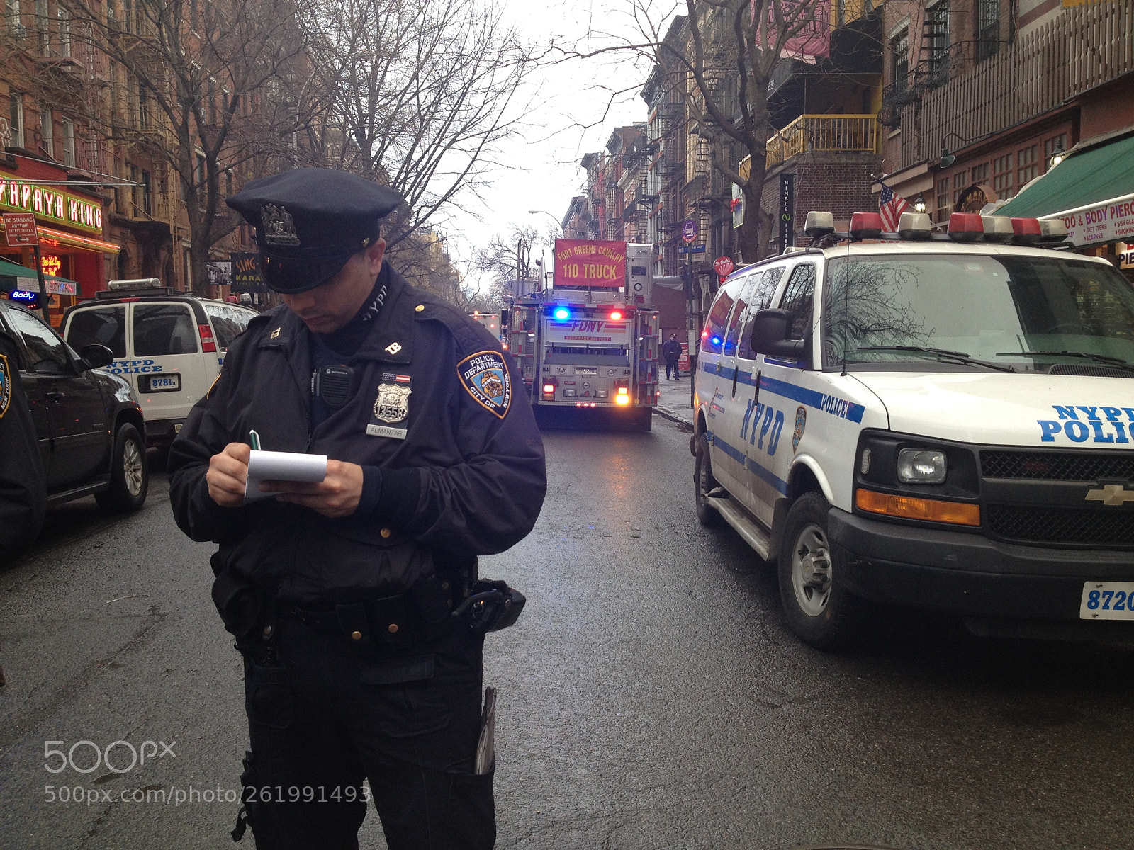 Apple iPhone 4S sample photo. Cop taking notes on photography