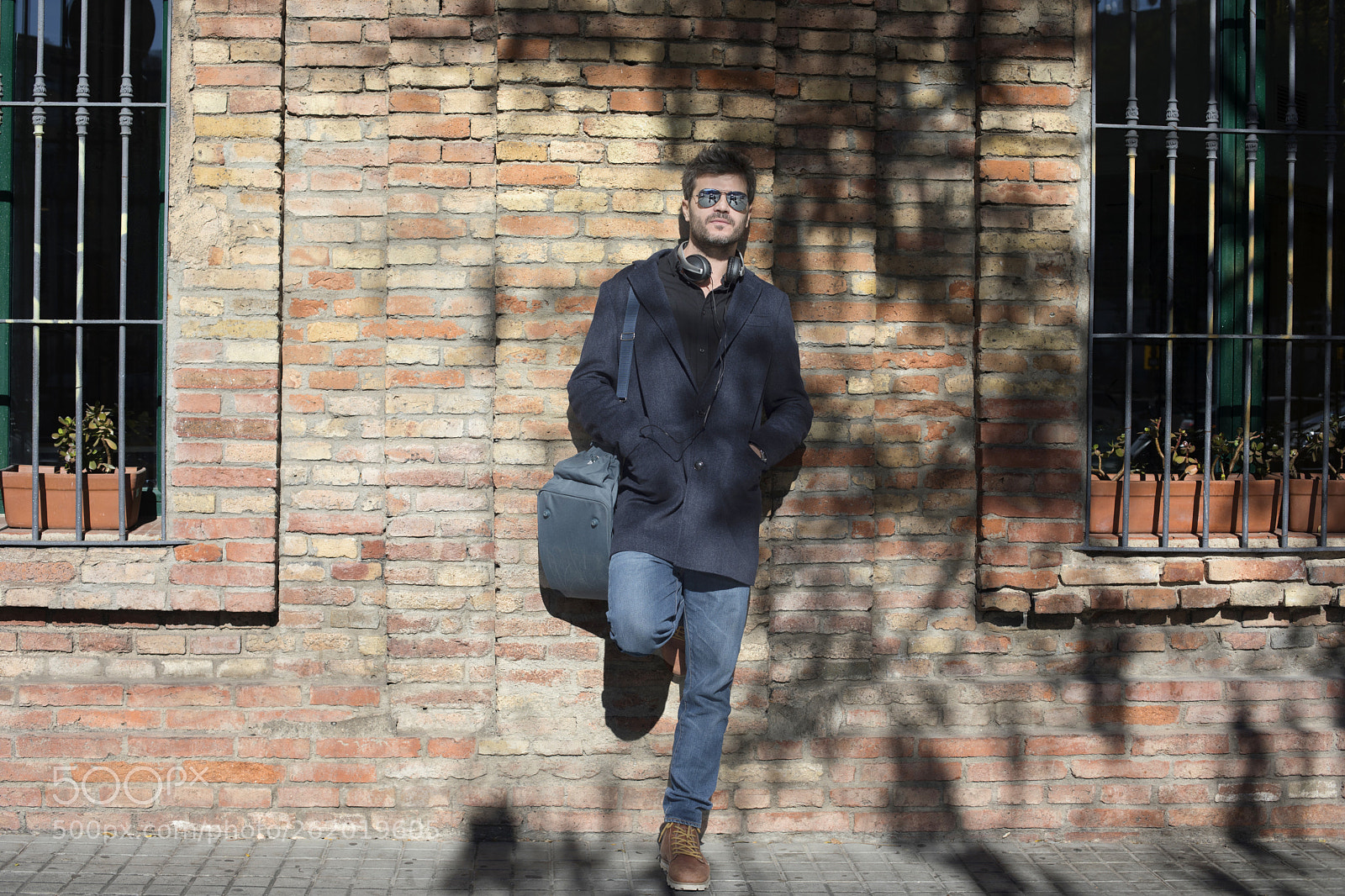 Canon EOS 5D Mark IV sample photo. Man standing and carrying photography