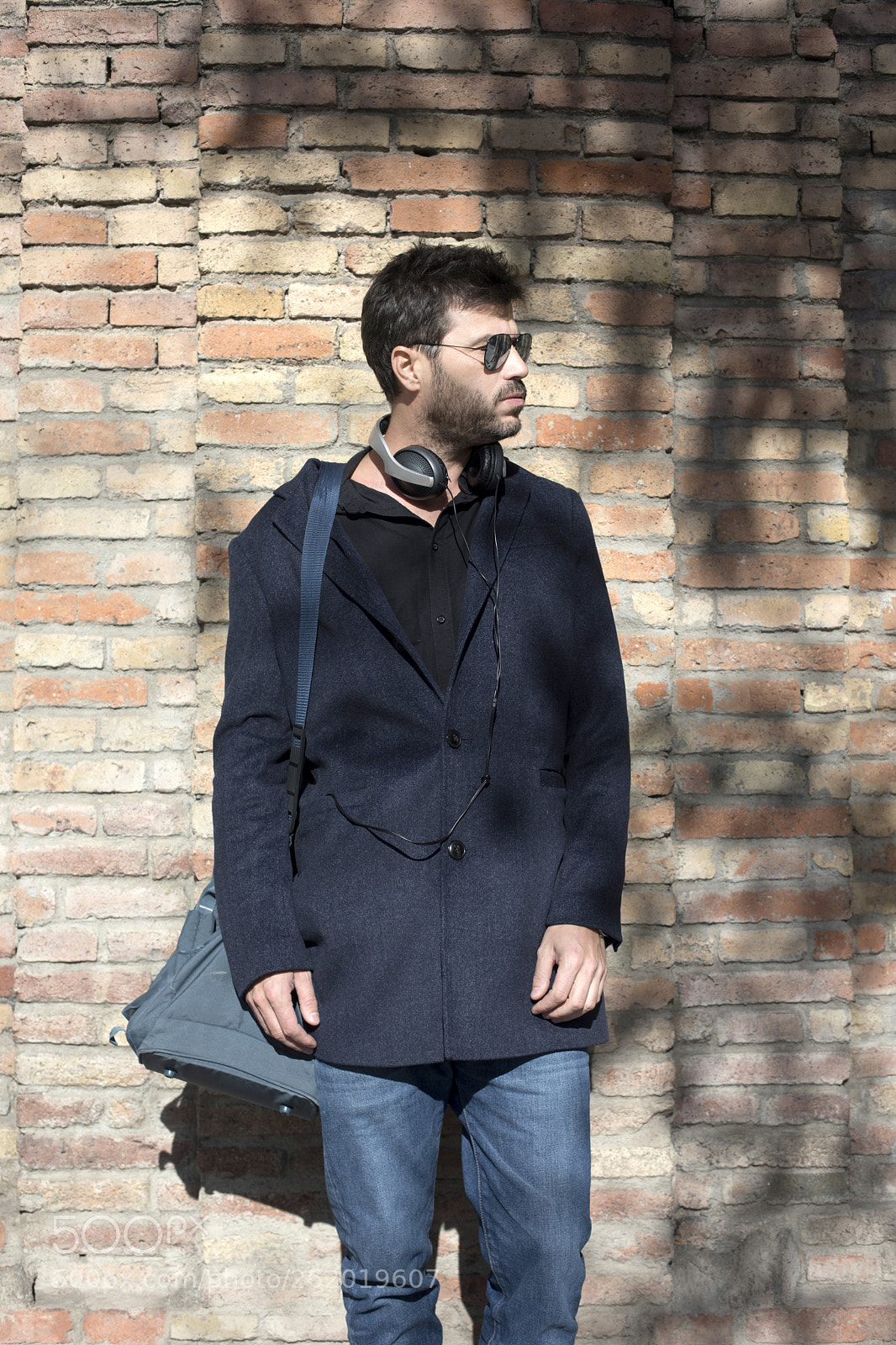 Canon EOS 5D Mark IV sample photo. Man standing and carrying photography