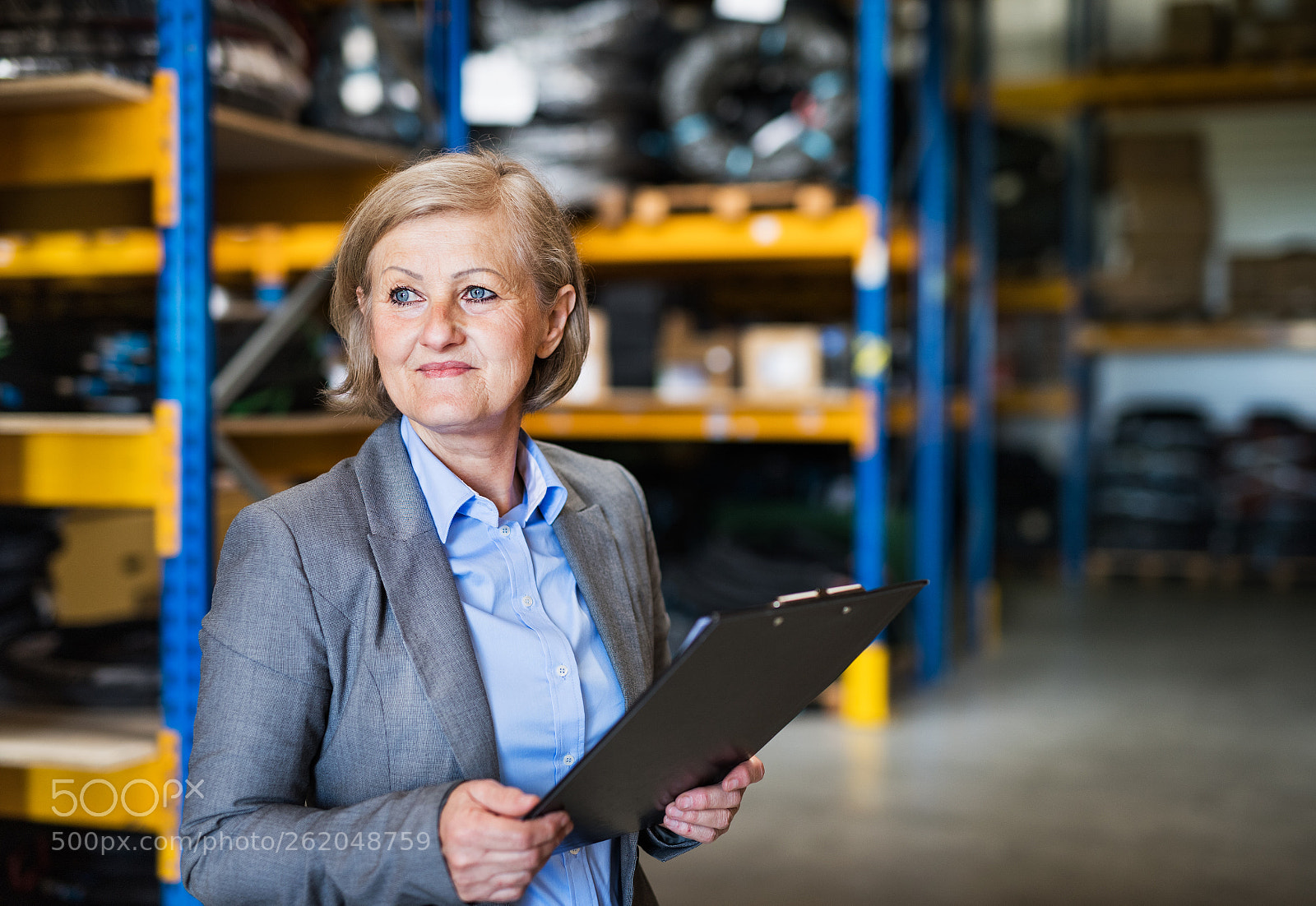 Nikon D5 sample photo. Senior woman warehouse manager photography