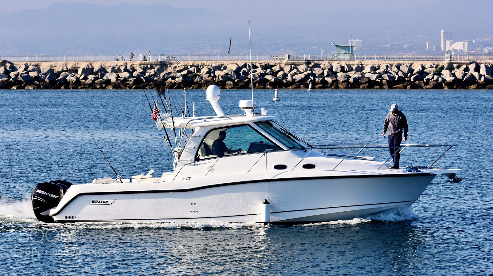 Nikon D7200 sample photo. White powerboat cruising the photography